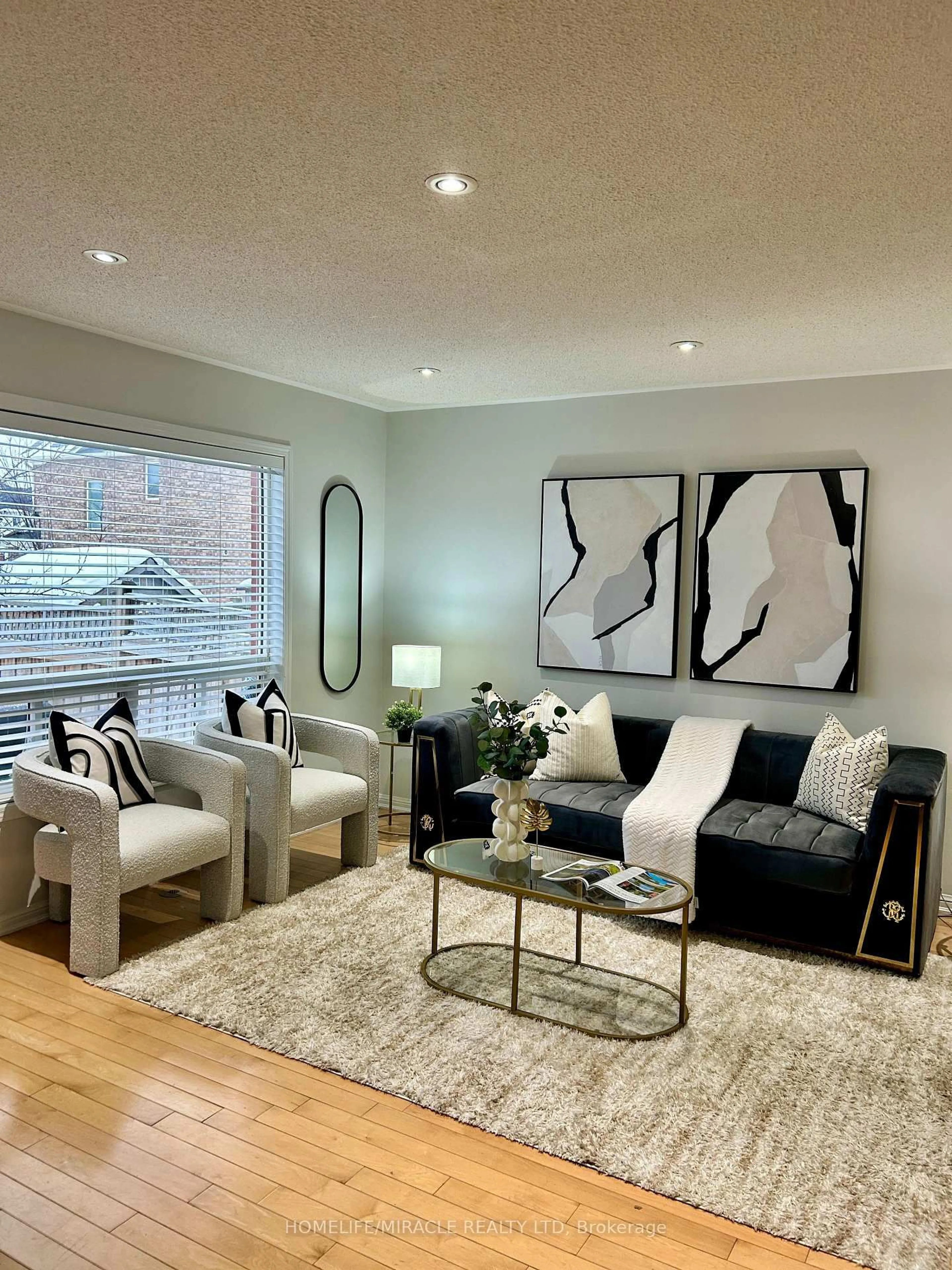 Living room with furniture, wood/laminate floor for 810 Hepburn Rd, Milton Ontario L9T 0K6