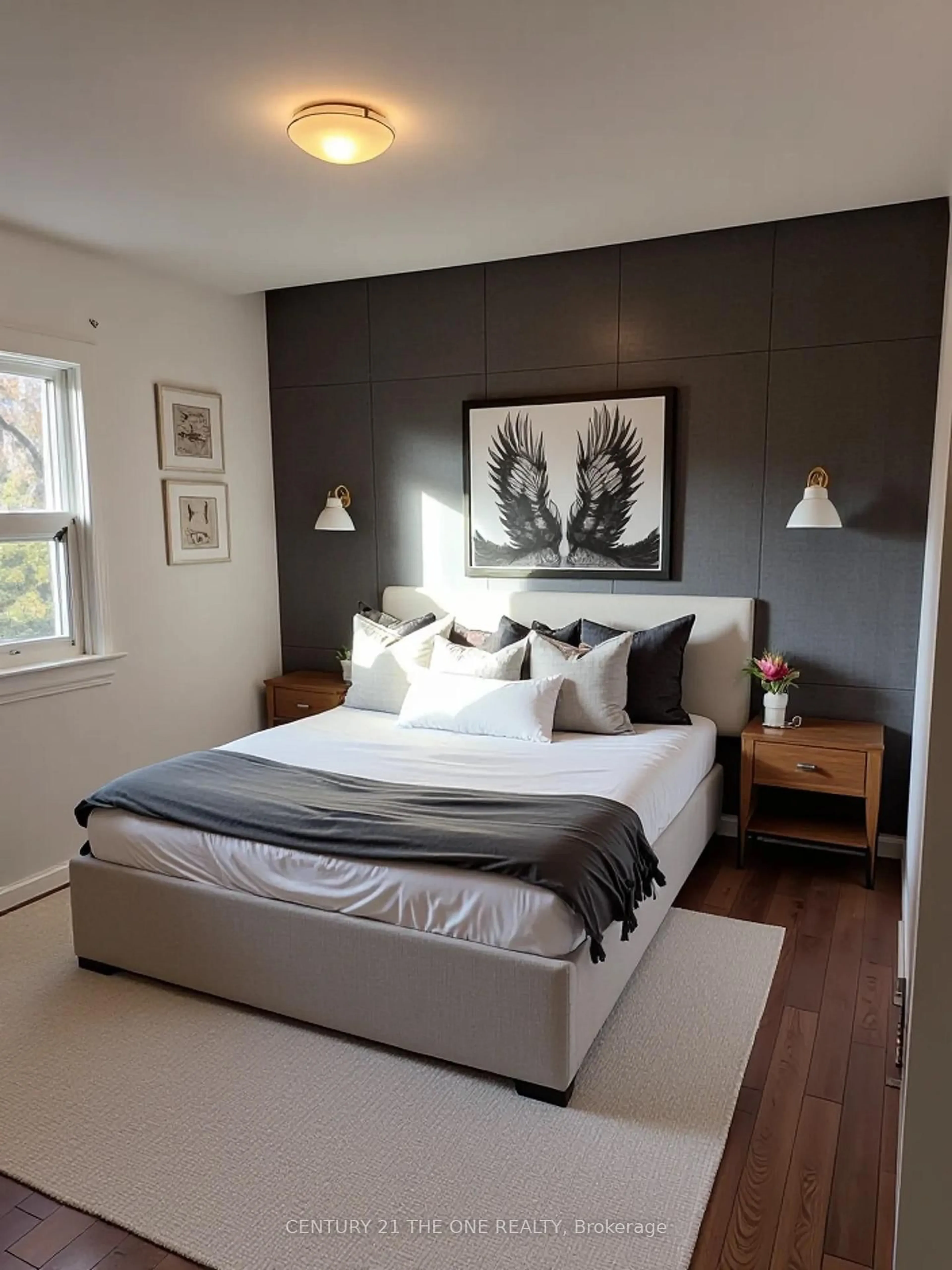 Bedroom with bed, wood/laminate floor for 26 Avon Ave, Toronto Ontario M6N 3W7