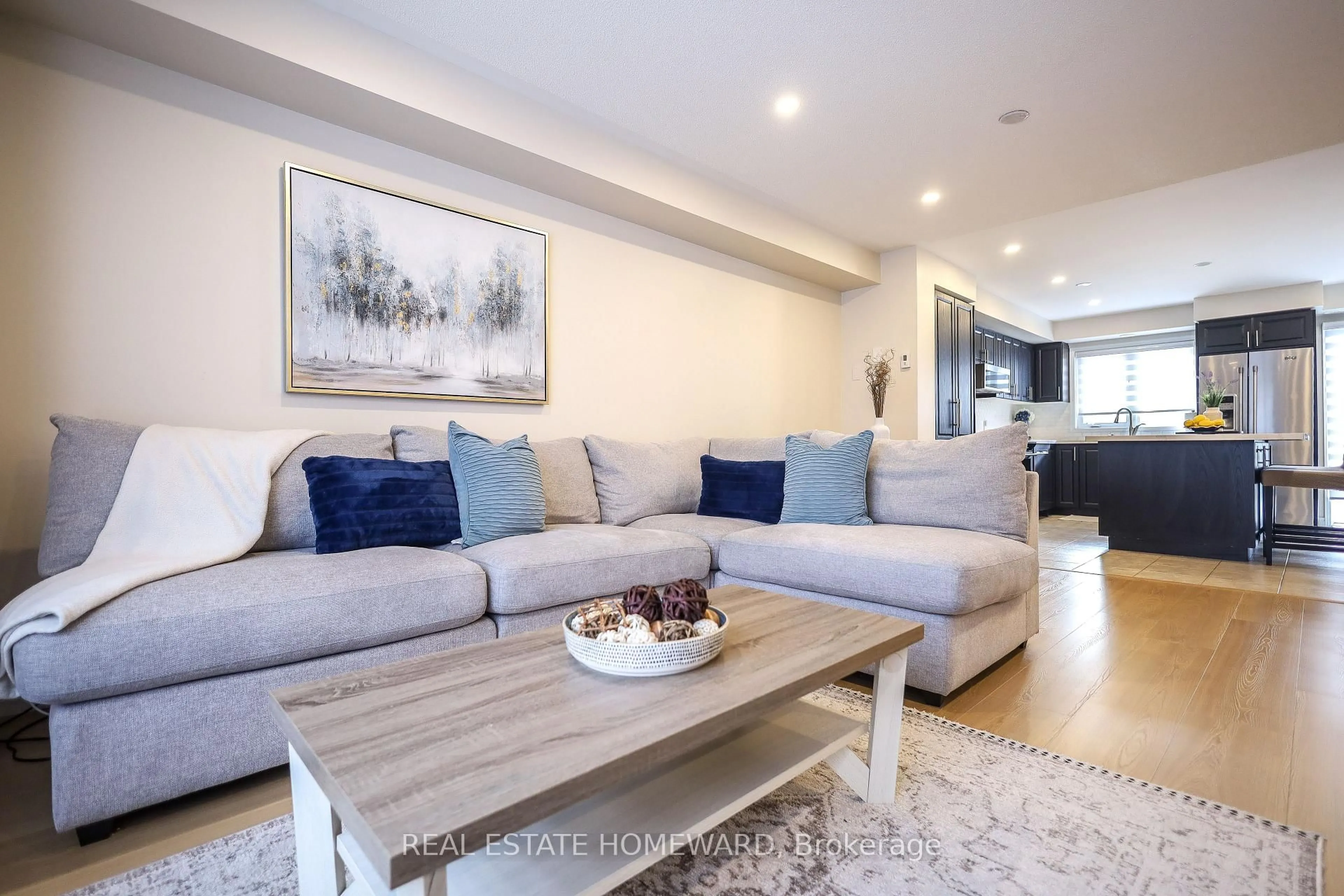 Living room with furniture, wood/laminate floor for 5650 Winston Churchill Blvd #51, Mississauga Ontario L5M 0L8