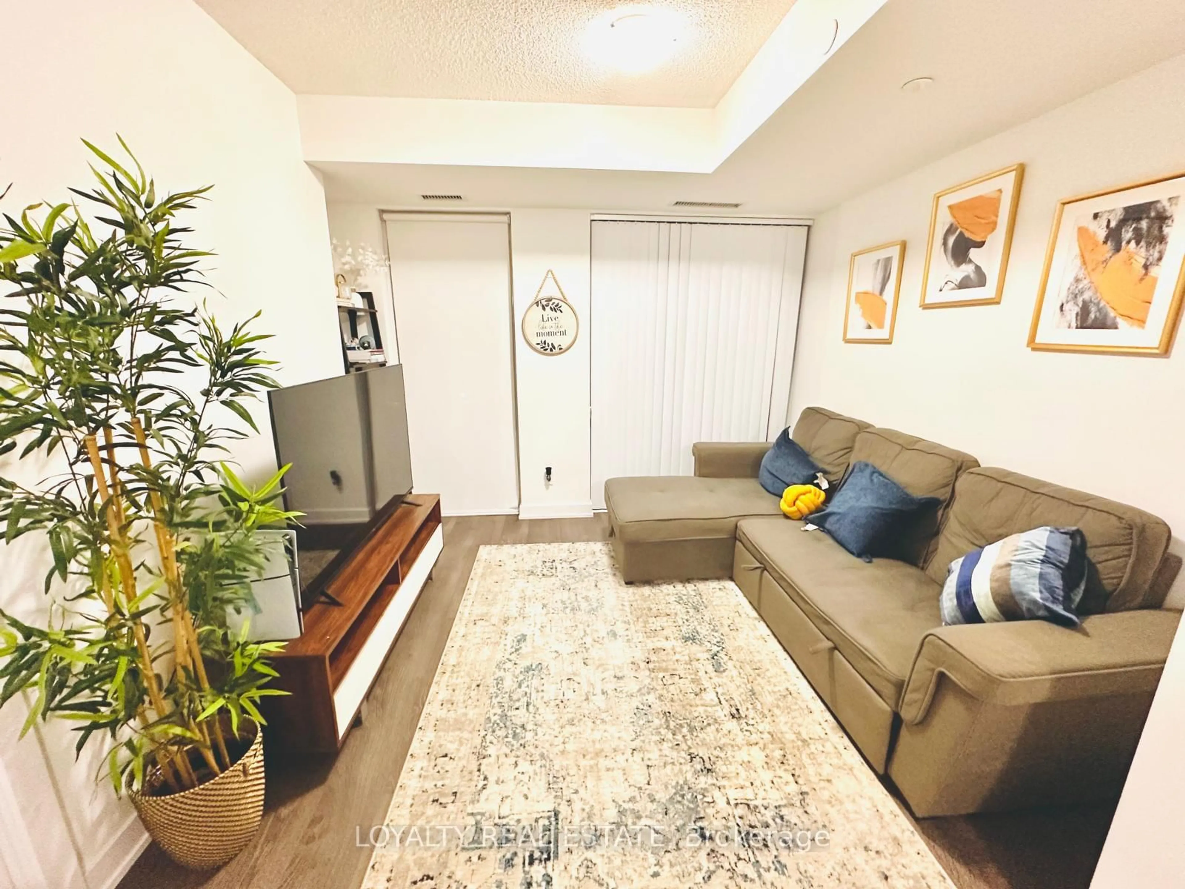 Living room with furniture, unknown for 251 Manitoba St #311, Toronto Ontario M8Y 0C7