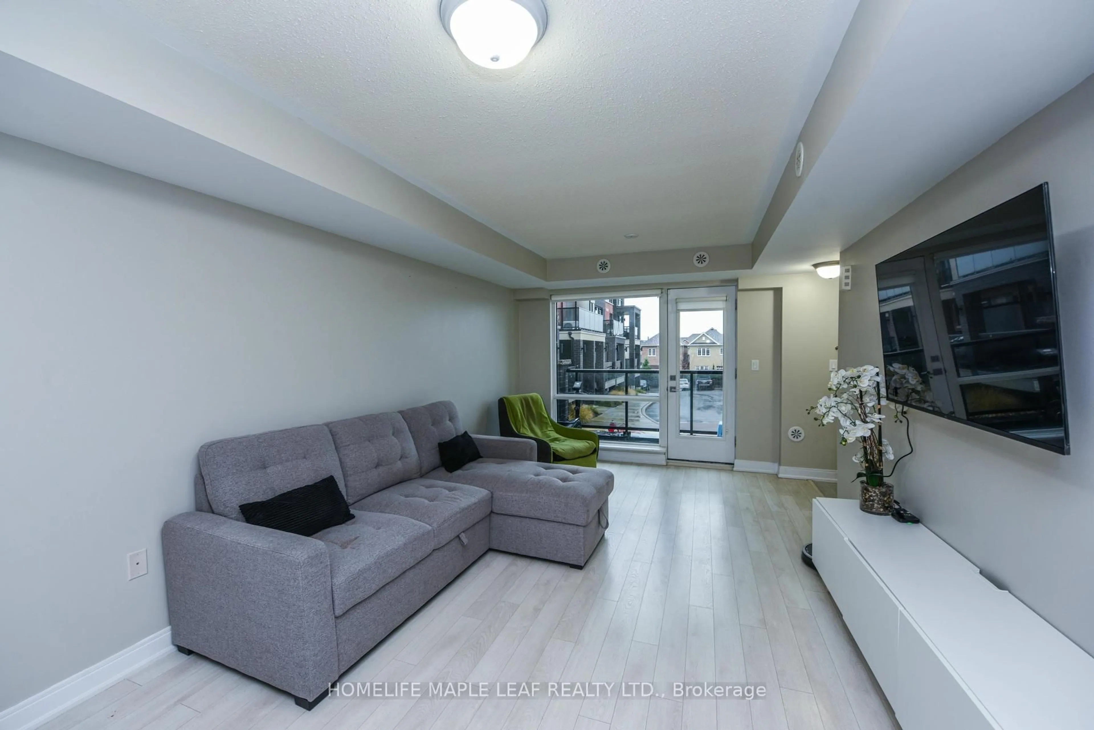 Living room with furniture, unknown for 100 Dufay Rd #98, Brampton Ontario L7A 4S3