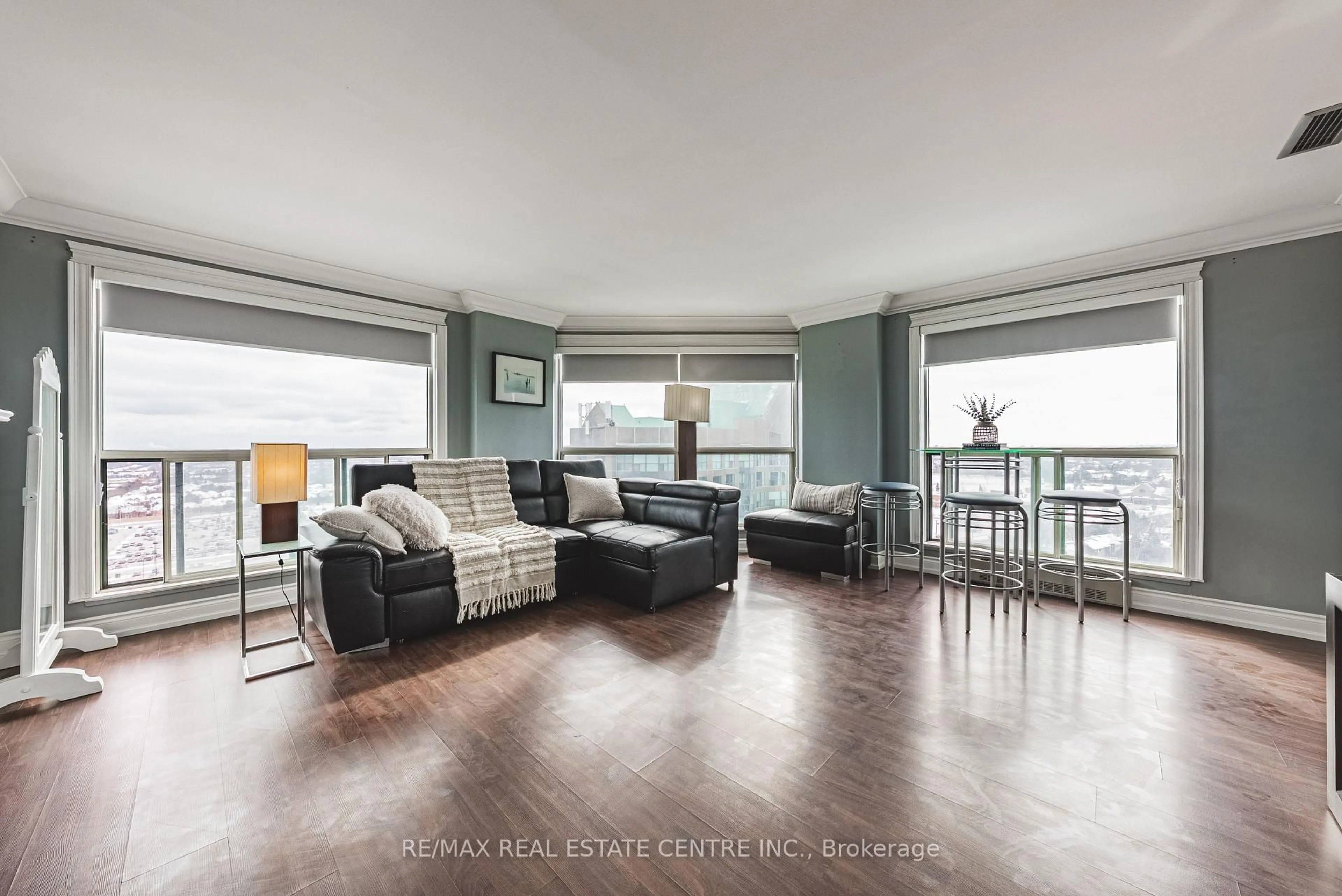 Living room with furniture, wood/laminate floor for 2155 Burnhamthorpe Rd #Ph1904, Mississauga Ontario L5L 5P4