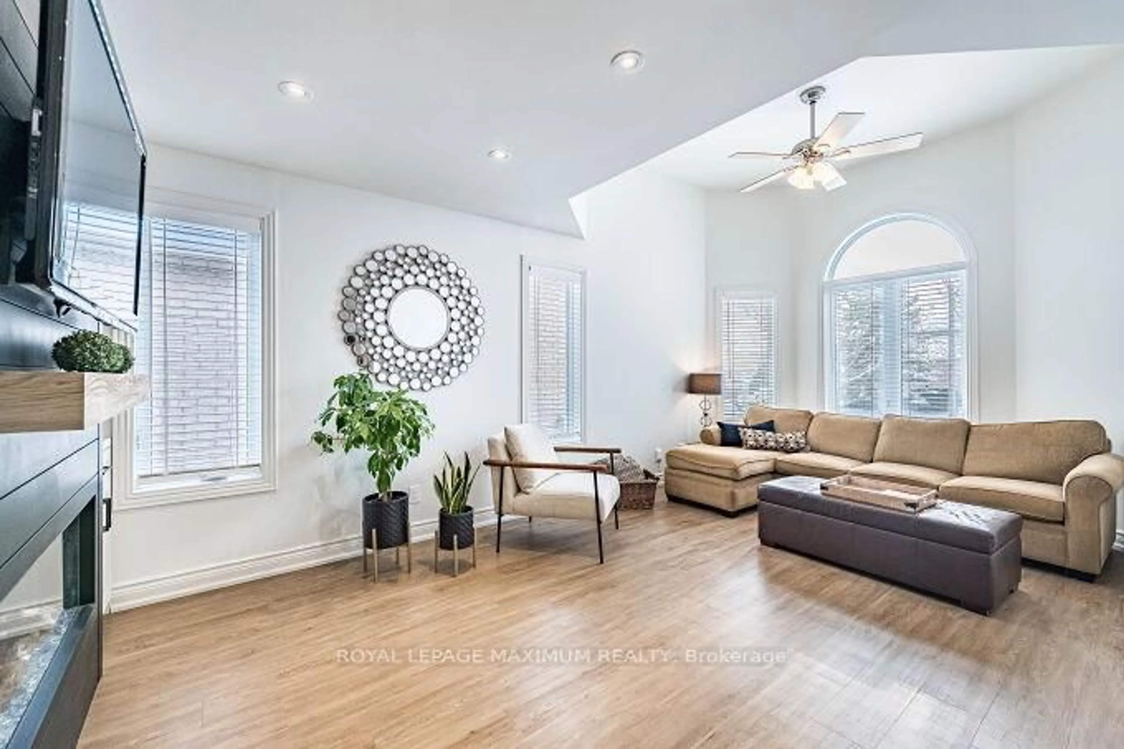 Living room with furniture, wood/laminate floor for 57 Royalton Dr, Caledon Ontario L7E 2G1