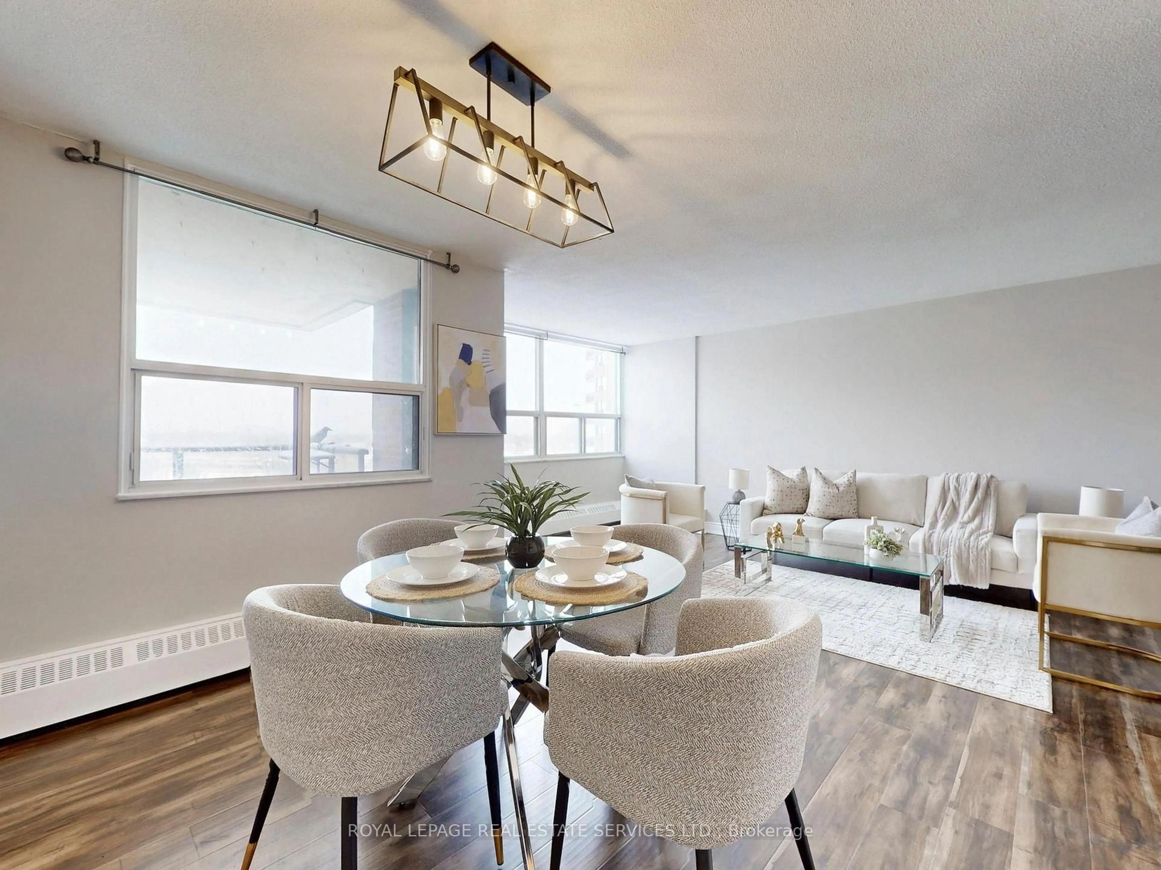 Dining room, wood/laminate floor for 551 The West Mall #702, Toronto Ontario M9C 1G7