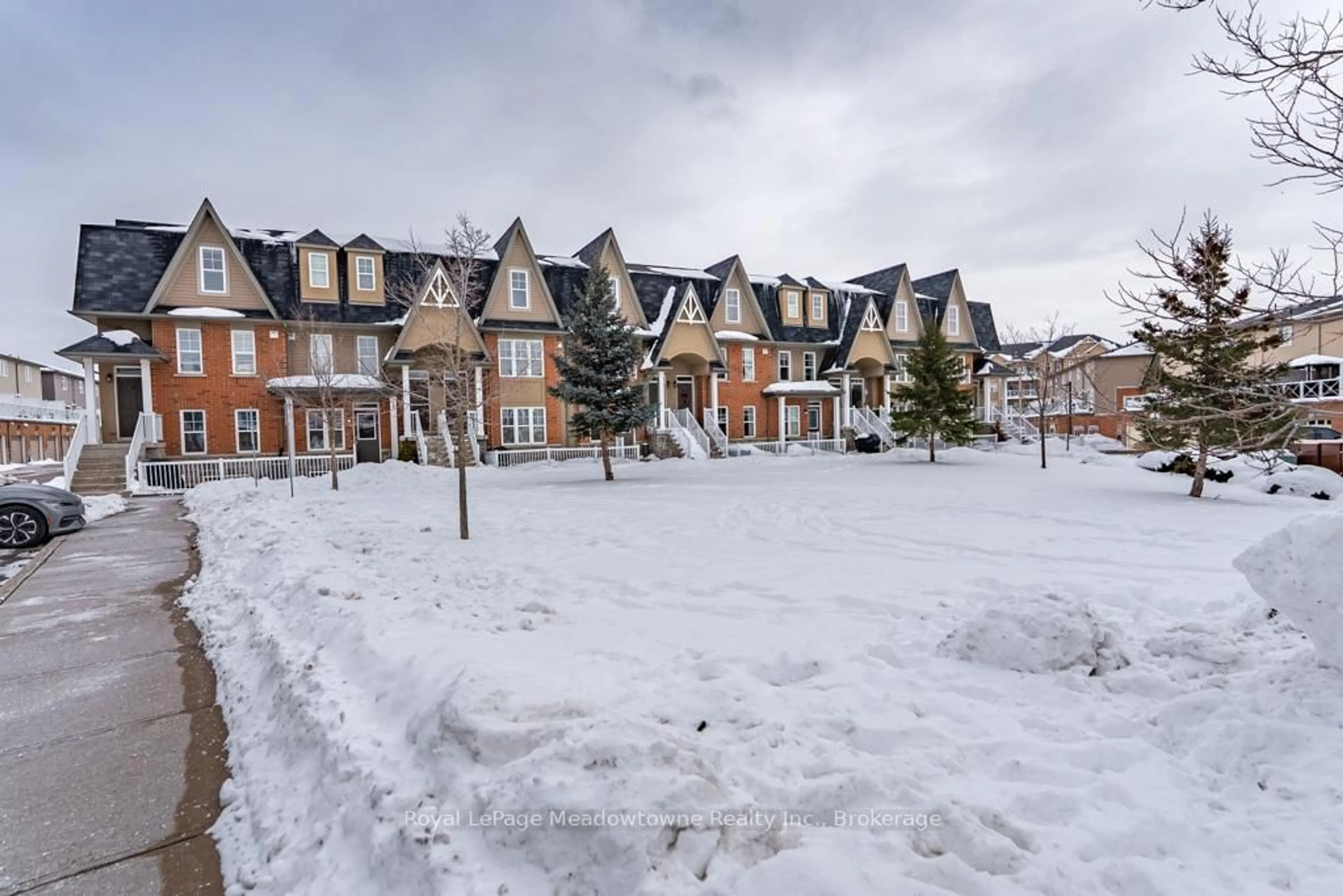 A pic from outside/outdoor area/front of a property/back of a property/a pic from drone, street for 1380 Costigan Rd #77, Milton Ontario L9T 8L2