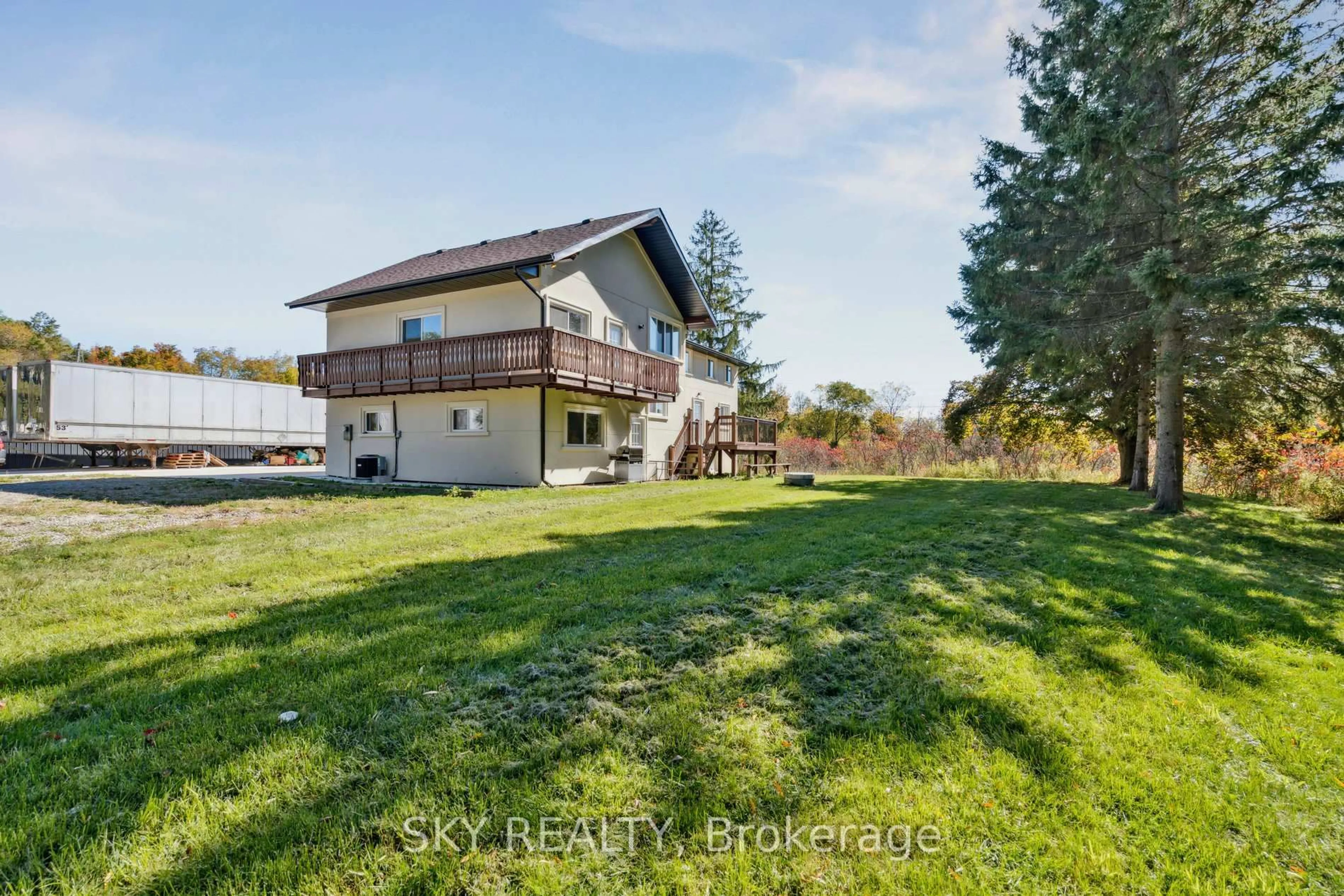 A pic from outside/outdoor area/front of a property/back of a property/a pic from drone, water/lake/river/ocean view for 12478 5 Line, Halton Hills Ontario L0P 1H0