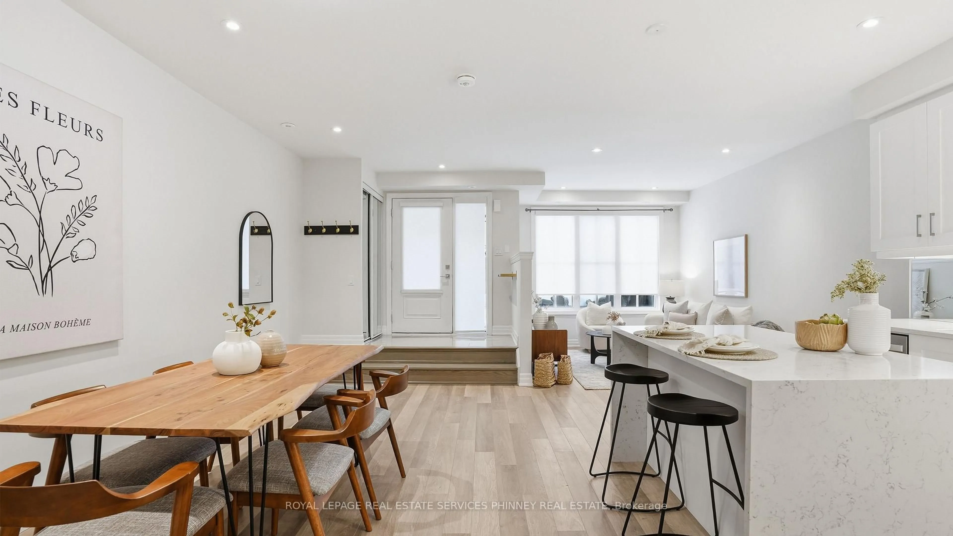 Open concept kitchen, wood/laminate floor for 652 Cricklewood Dr #201, Mississauga Ontario L5G 0A5