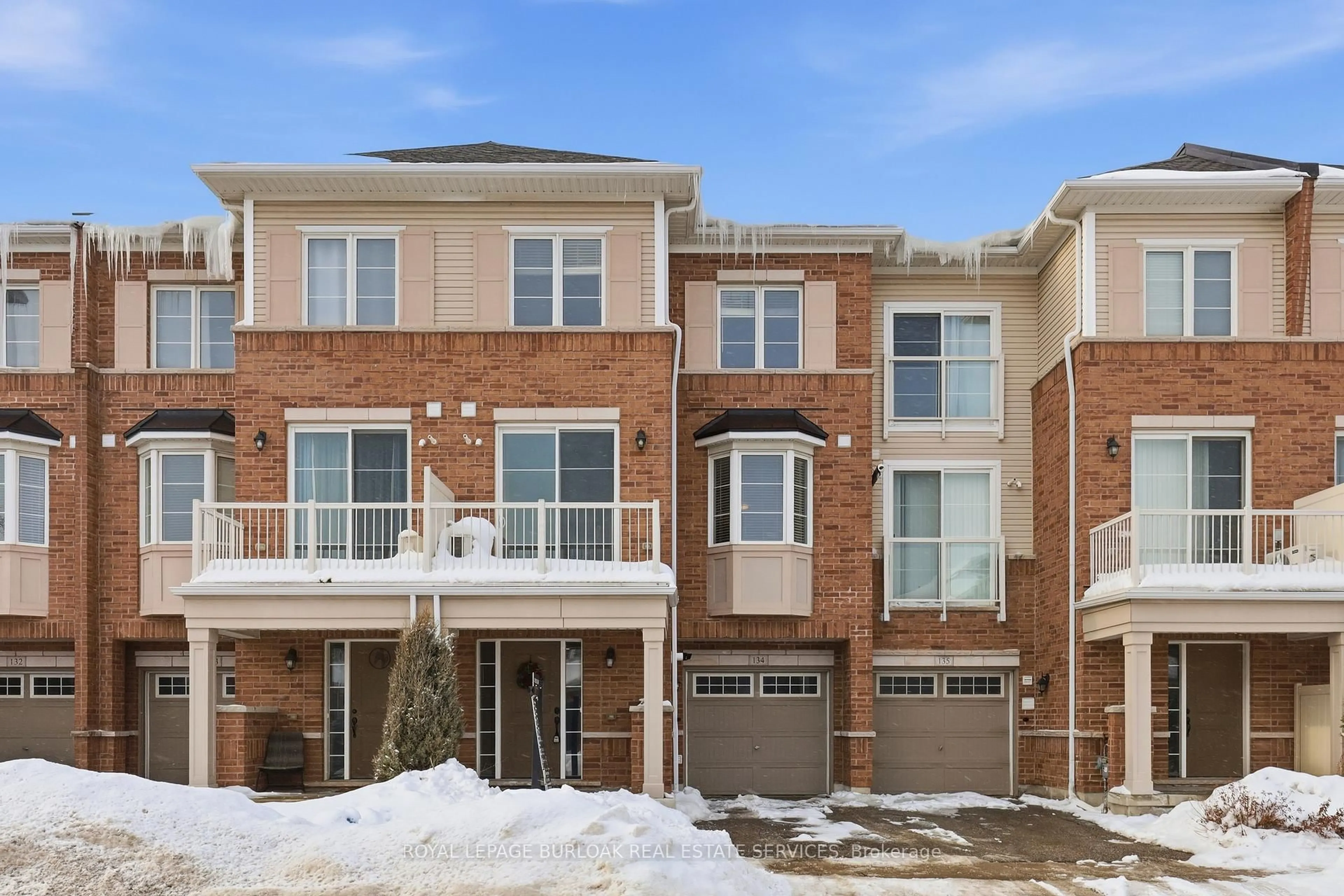 Home with brick exterior material, street for 165 Hampshire Way #134, Milton Ontario L9T 8M7
