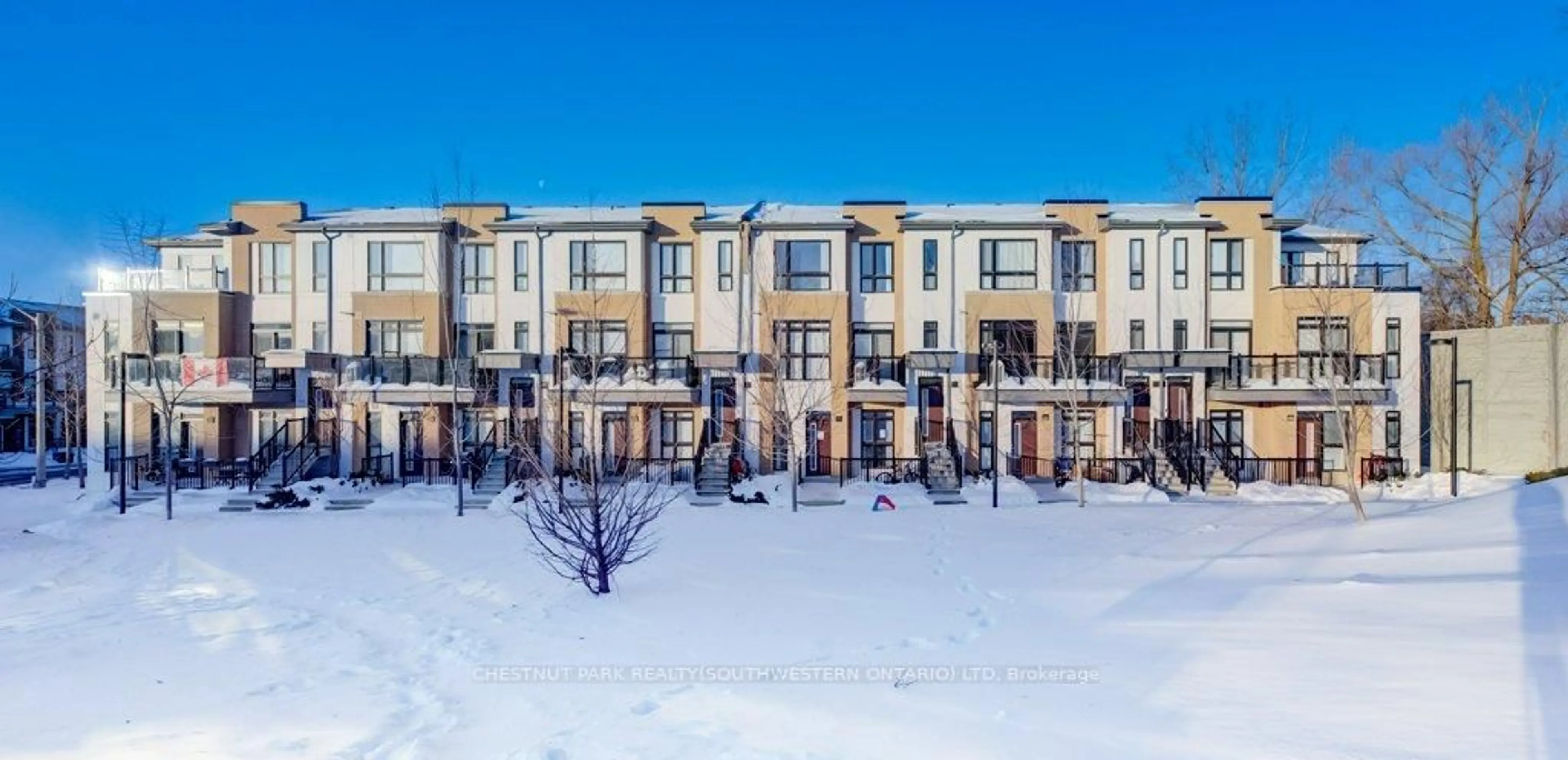 A pic from outside/outdoor area/front of a property/back of a property/a pic from drone, unknown for 90 Canon Jackson Dr #103, Toronto Ontario M6M 0C1