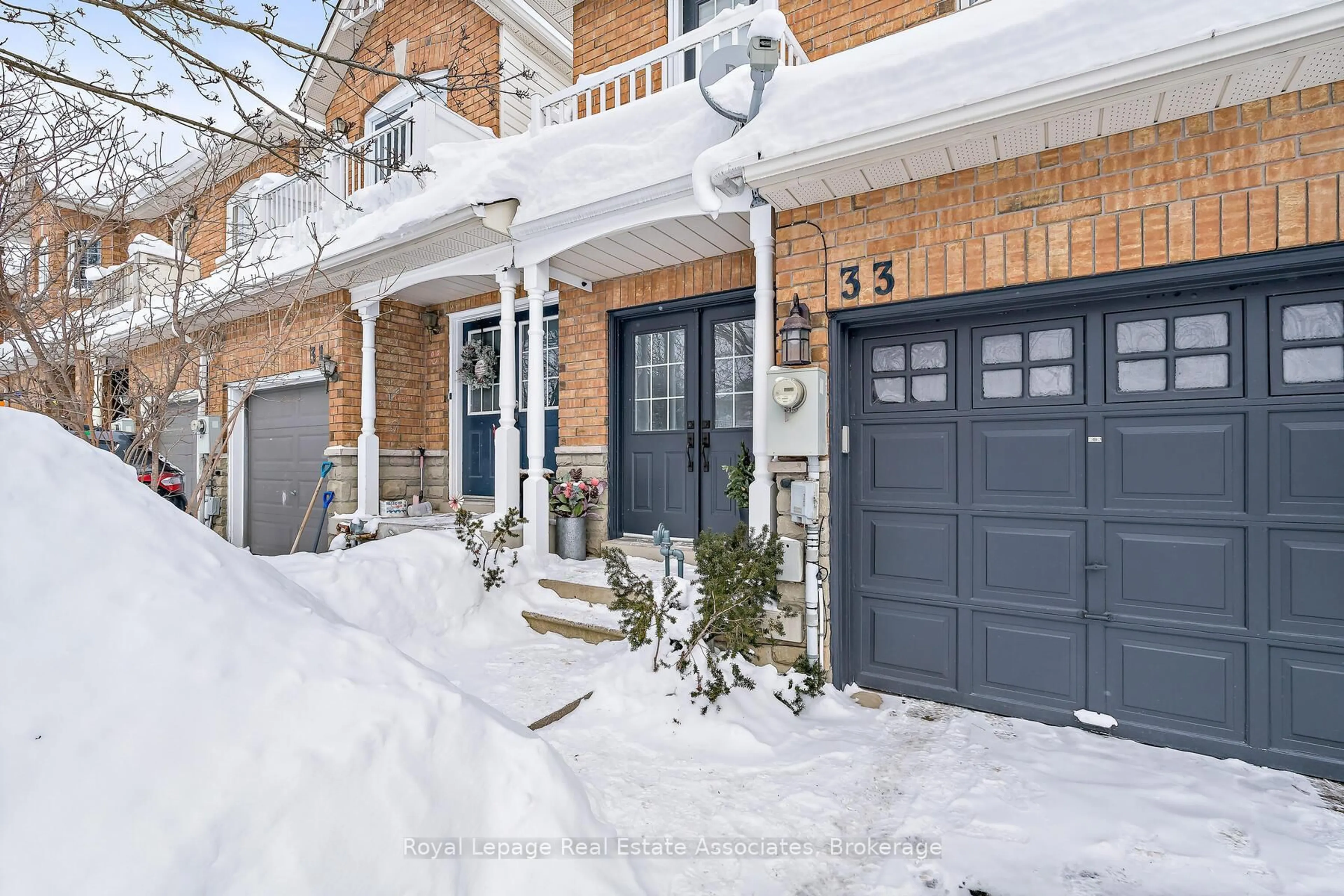 Home with brick exterior material, street for 33 Bradley Dr, Halton Hills Ontario L7G 6B5