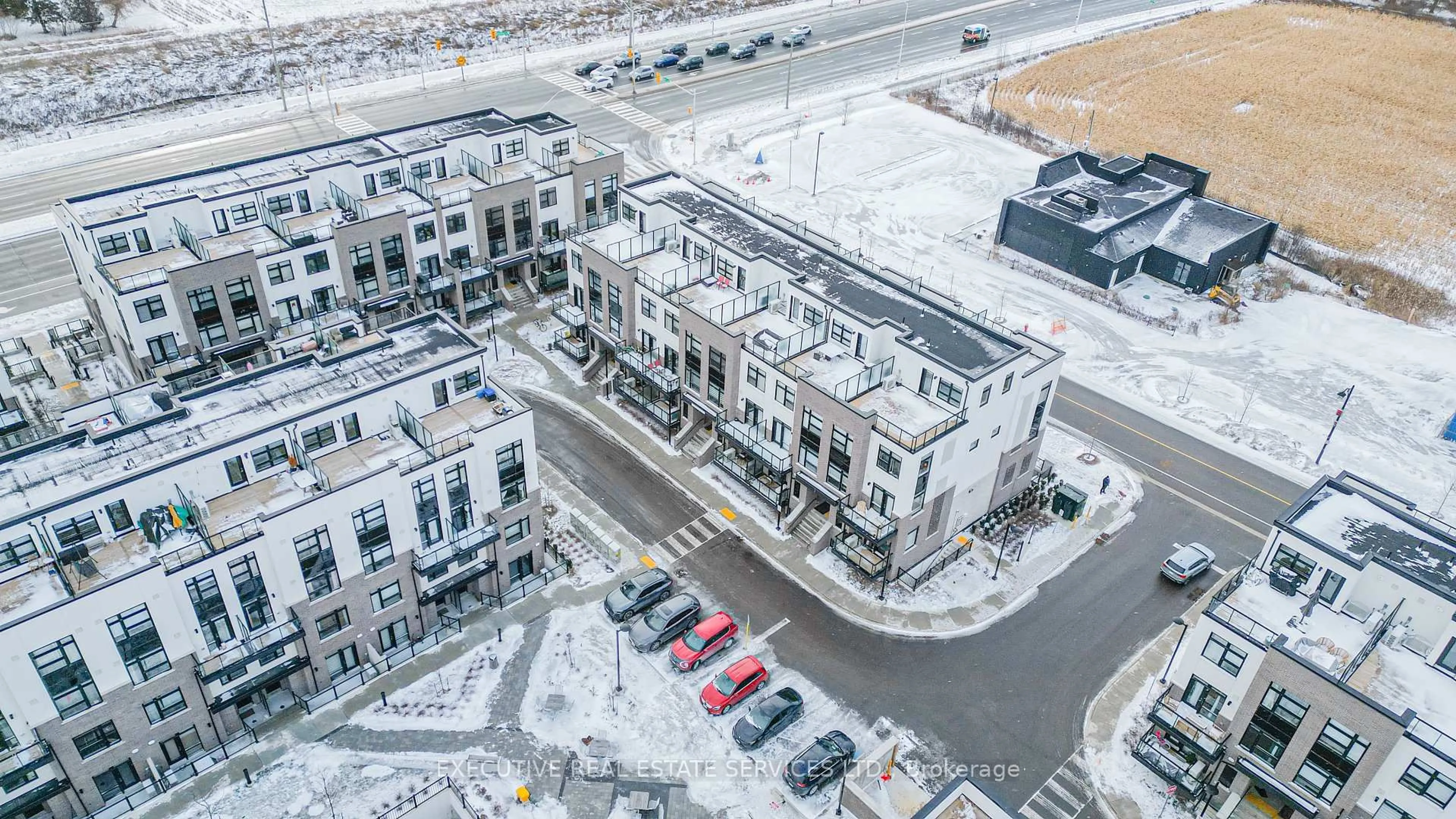 A pic from outside/outdoor area/front of a property/back of a property/a pic from drone, unknown for 1589 Rose Way #105, Milton Ontario L9E 0J2