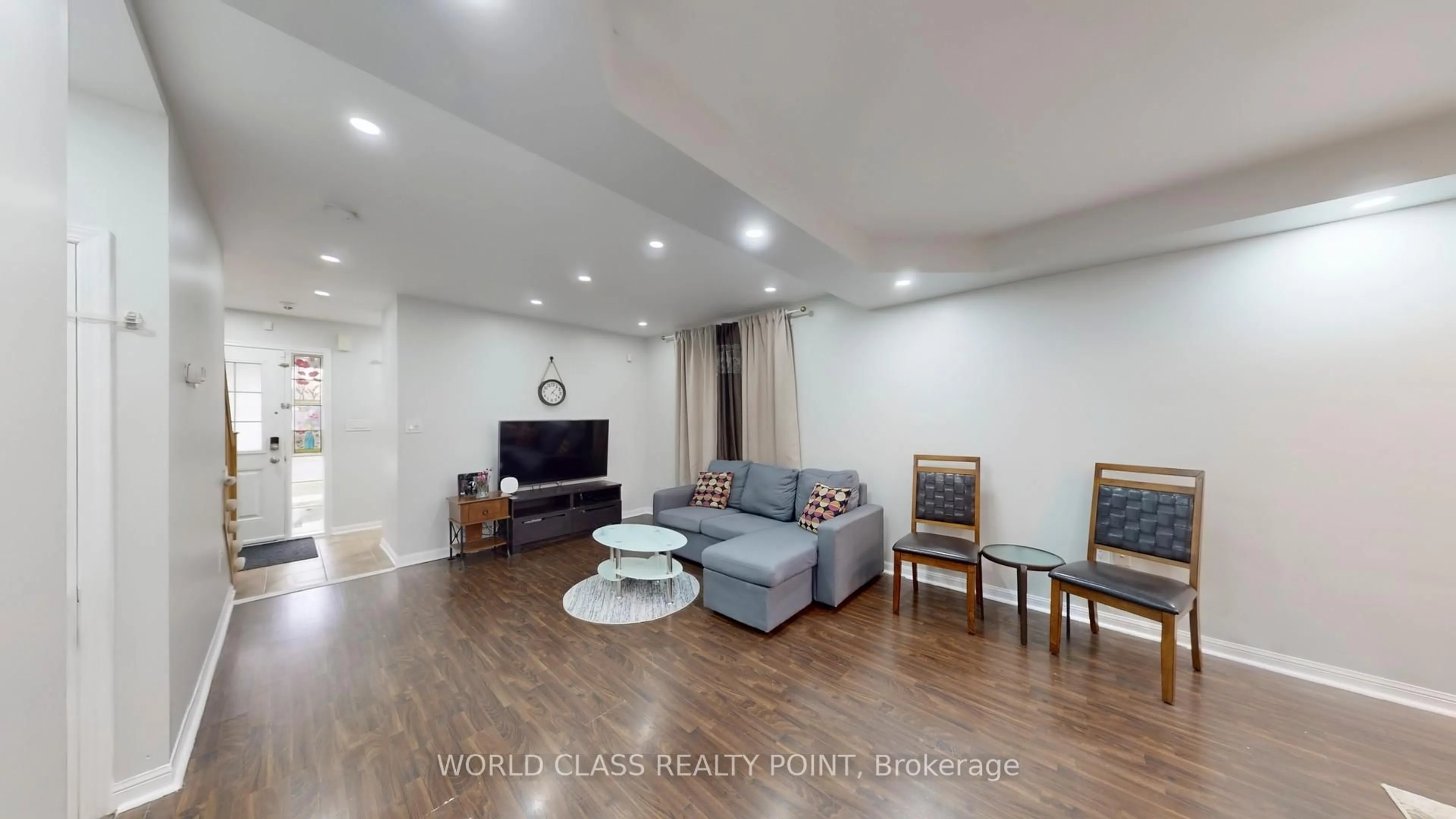 Living room with furniture, wood/laminate floor for 382 Pringle Ave, Milton Ontario L9T 7M4