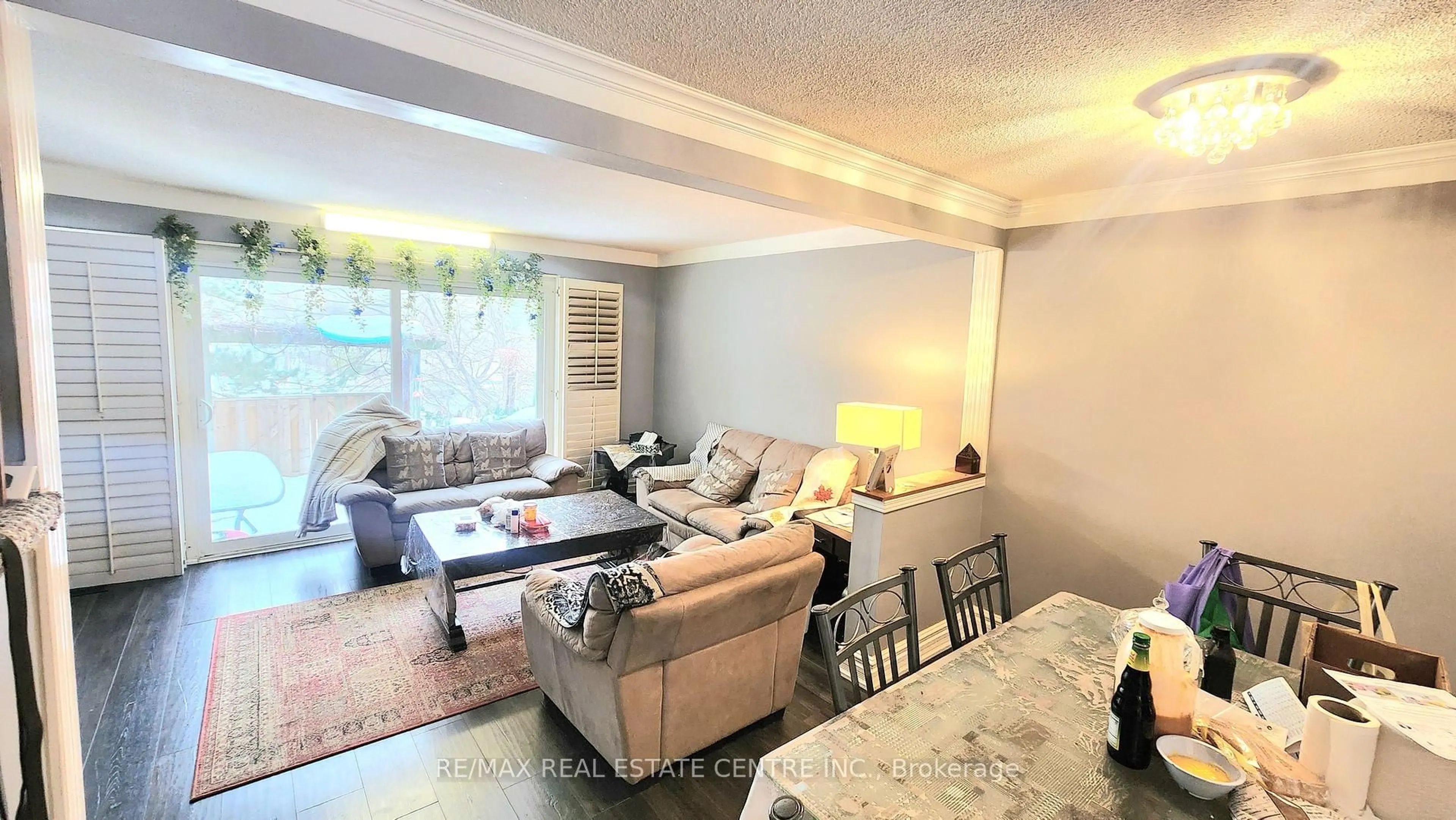Living room with furniture, unknown for 59 Kenninghall Blvd #17, Mississauga Ontario L5N 1J6