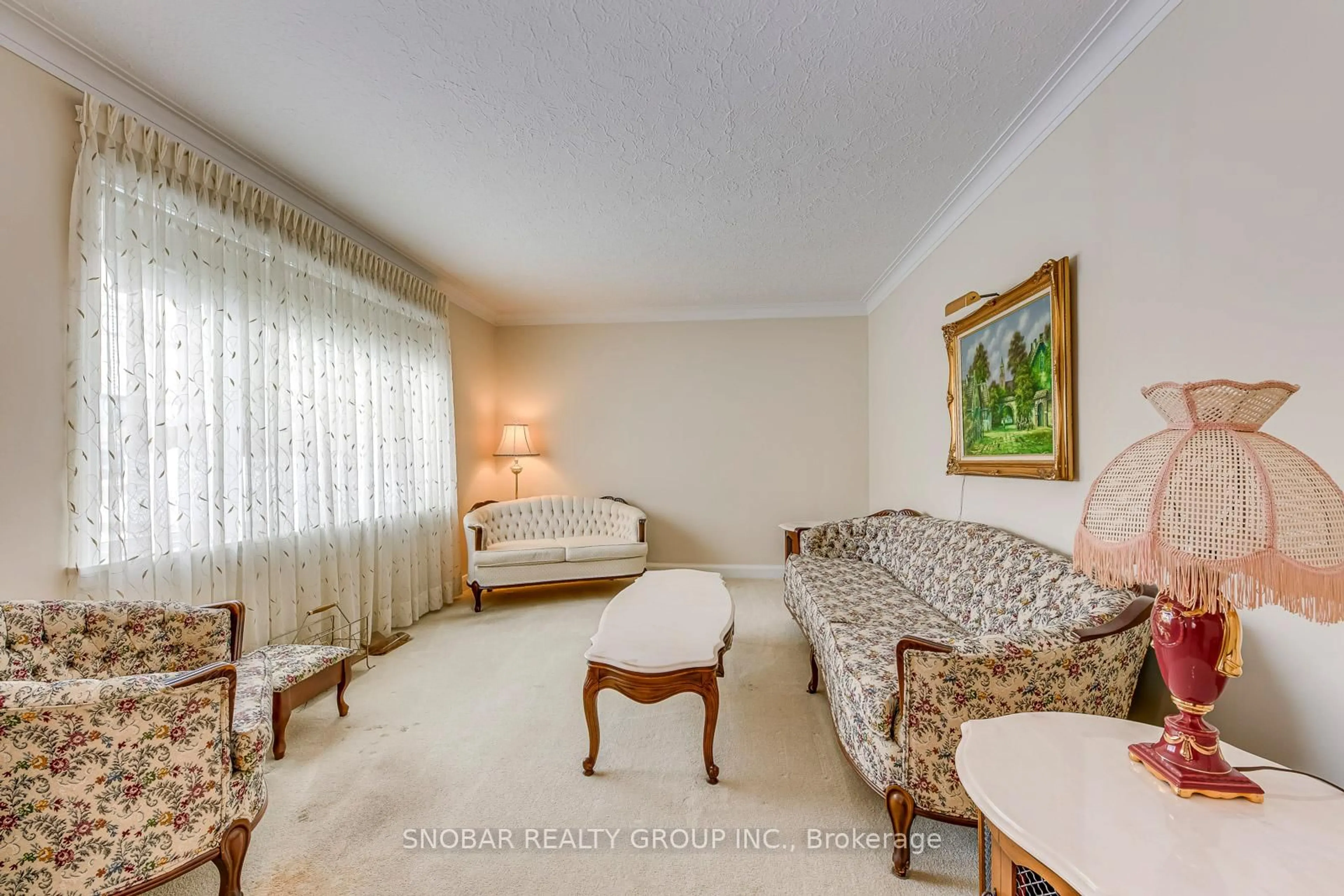 Living room with furniture, carpet floor for 20 Meadow Lane Ave, Toronto Ontario M3L 1C1