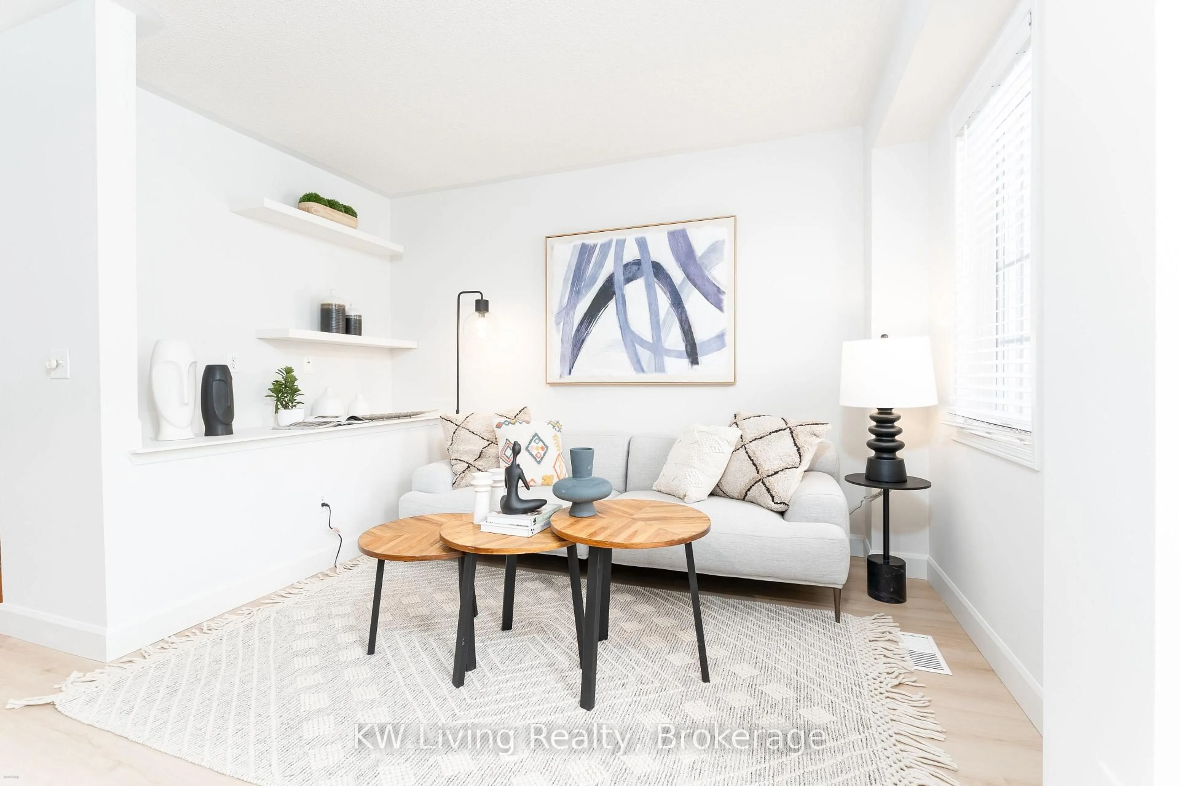 Living room with furniture, wood/laminate floor for 180 Forum Dr #6, Mississauga Ontario L4Z 3Y2