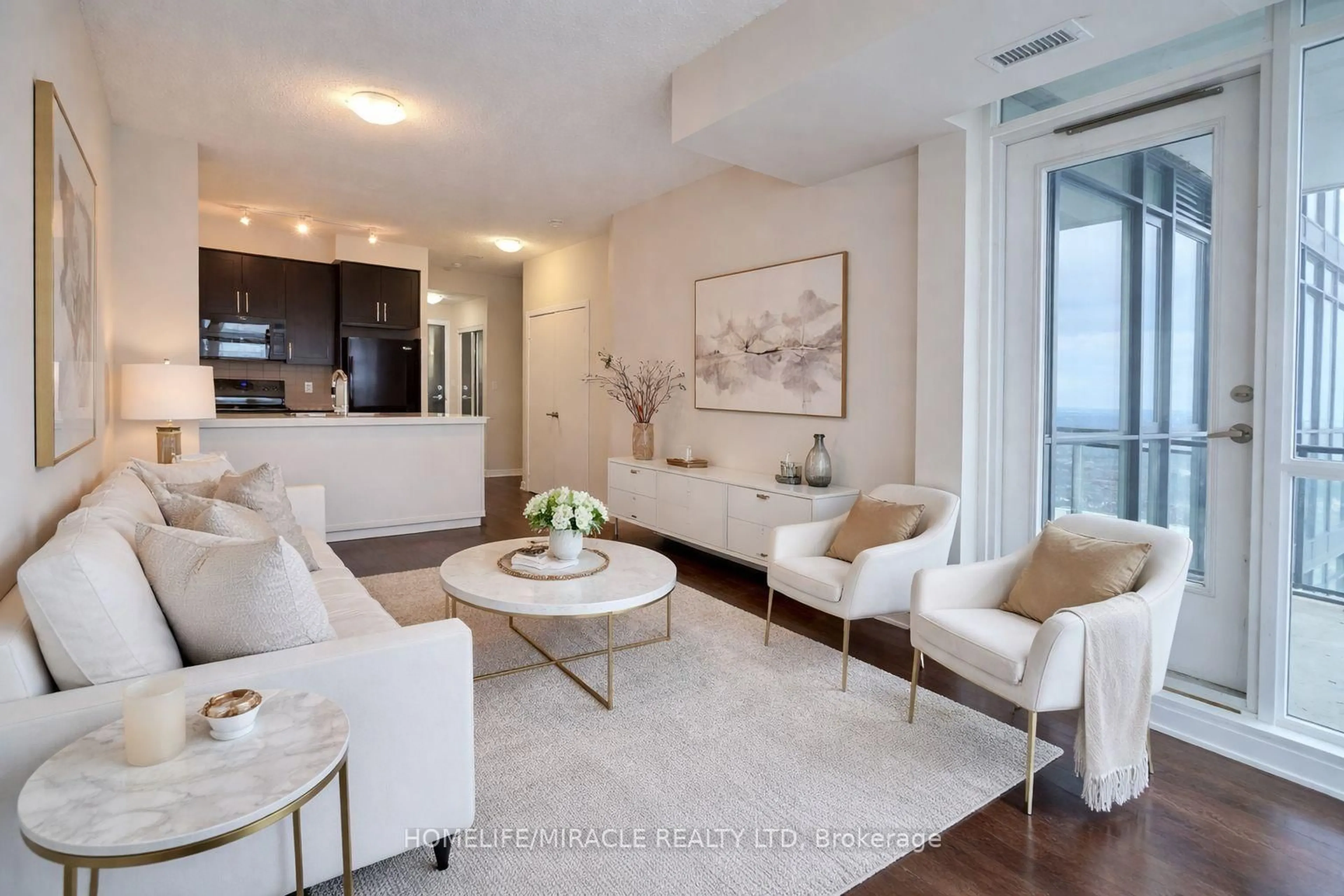 Living room with furniture, unknown for 4070 Confederation Pkwy #3408, Mississauga Ontario L5B 0E9