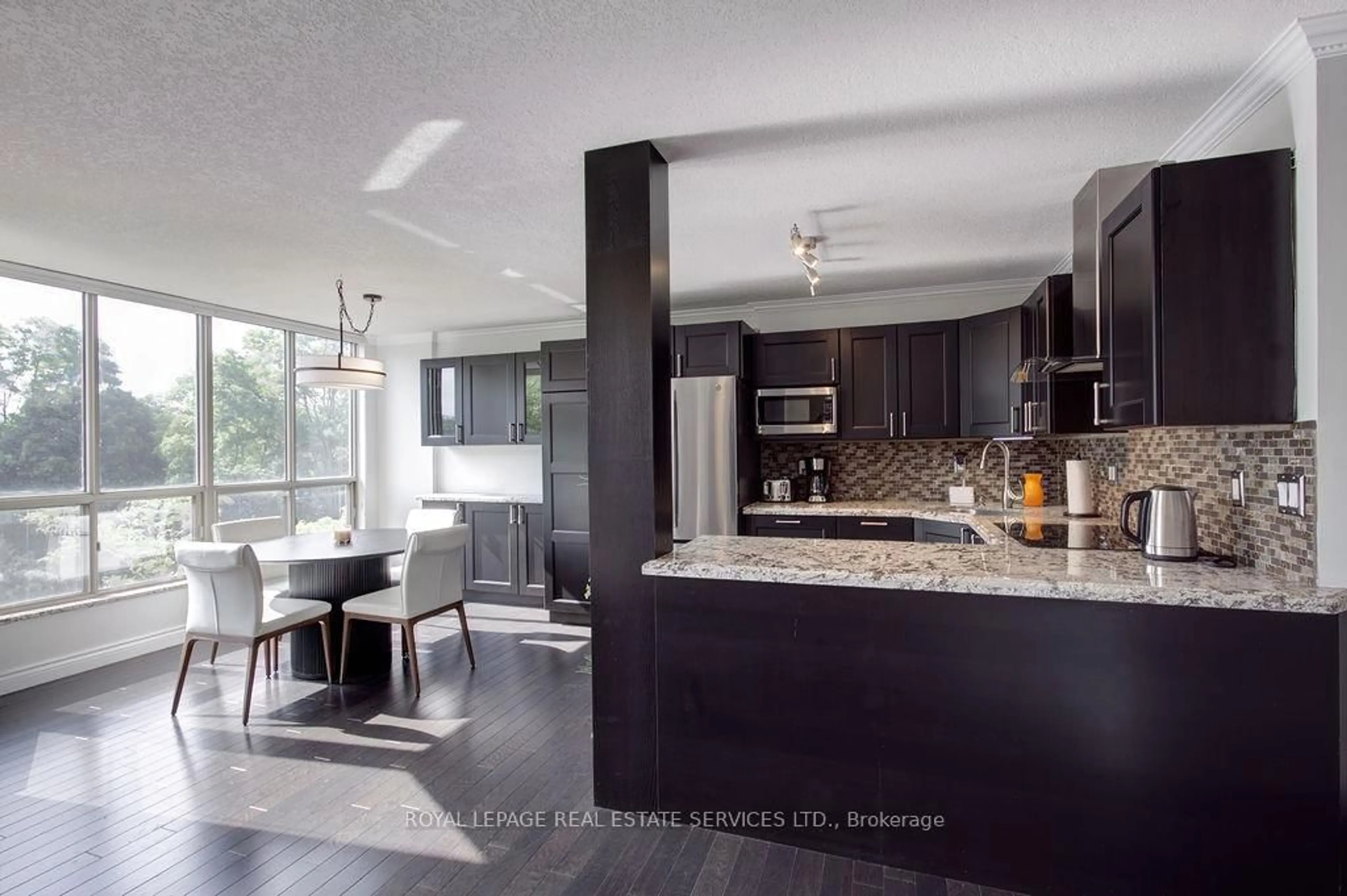 Open concept kitchen, ceramic/tile floor for 1110 Walden Circ #410, Mississauga Ontario L5J 4R3