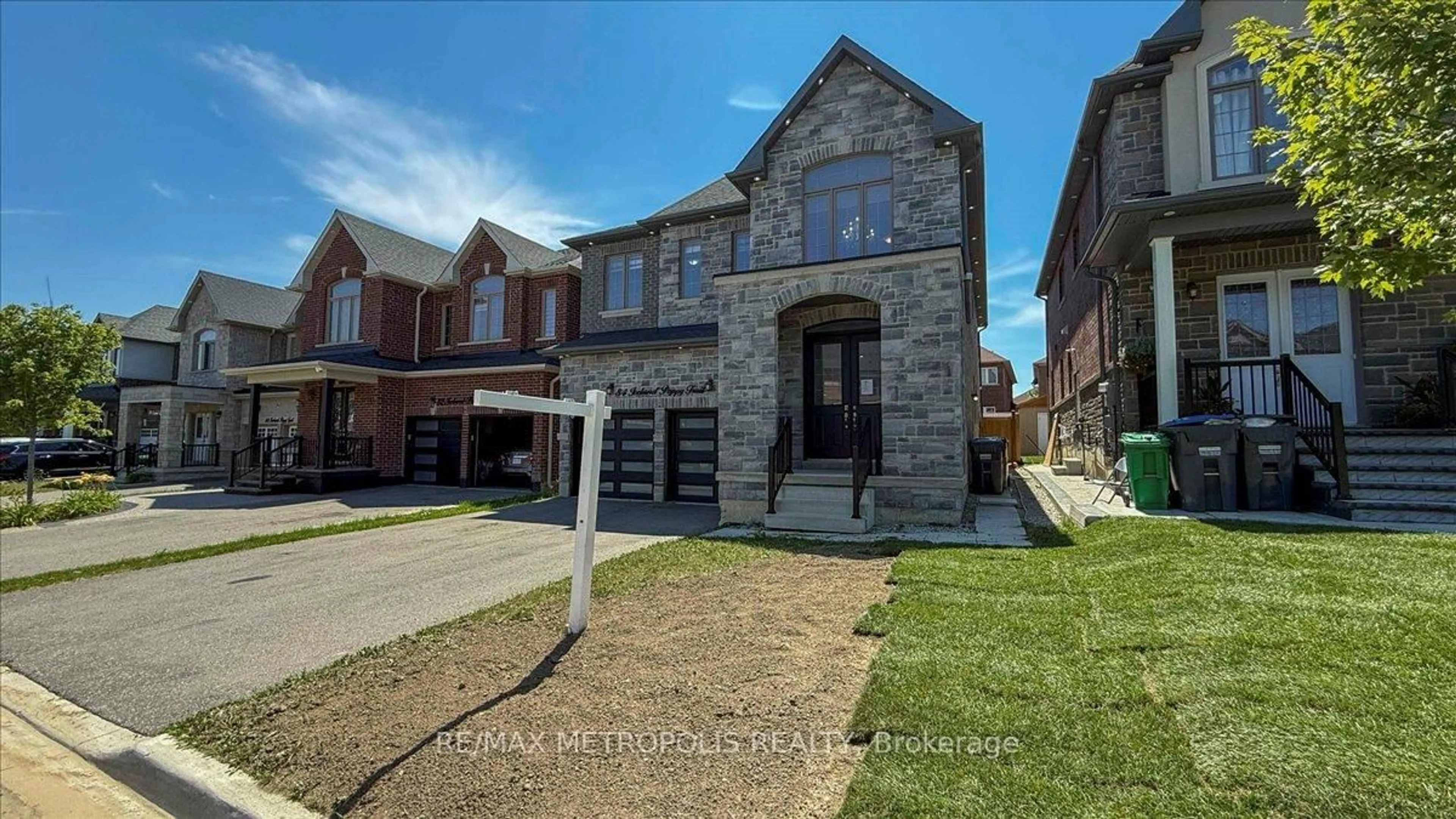 Home with brick exterior material, street for 84 Iceland Poppy Tr, Brampton Ontario L7A 0C1