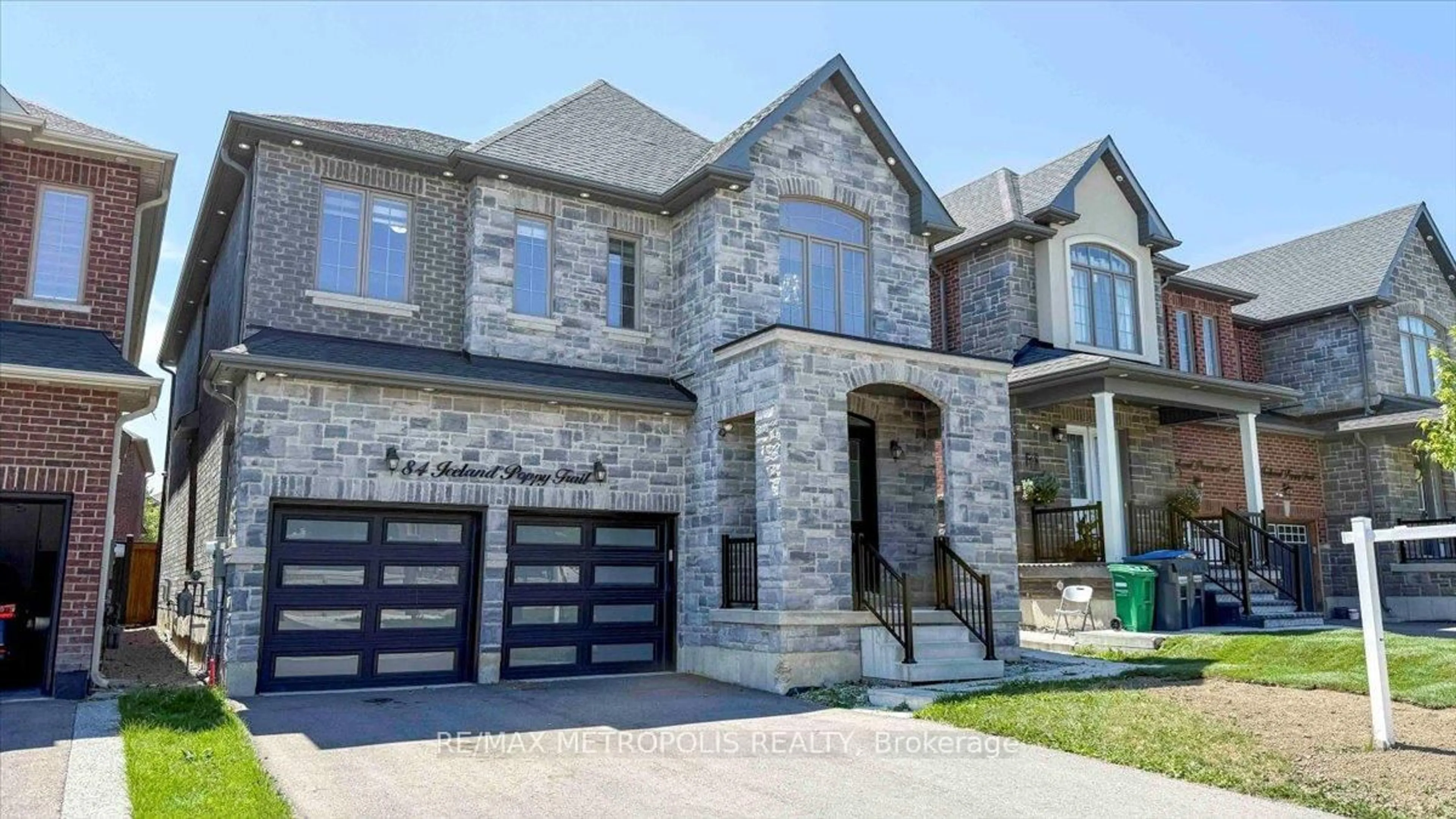 Home with brick exterior material, street for 84 Iceland Poppy Tr, Brampton Ontario L7A 0C1