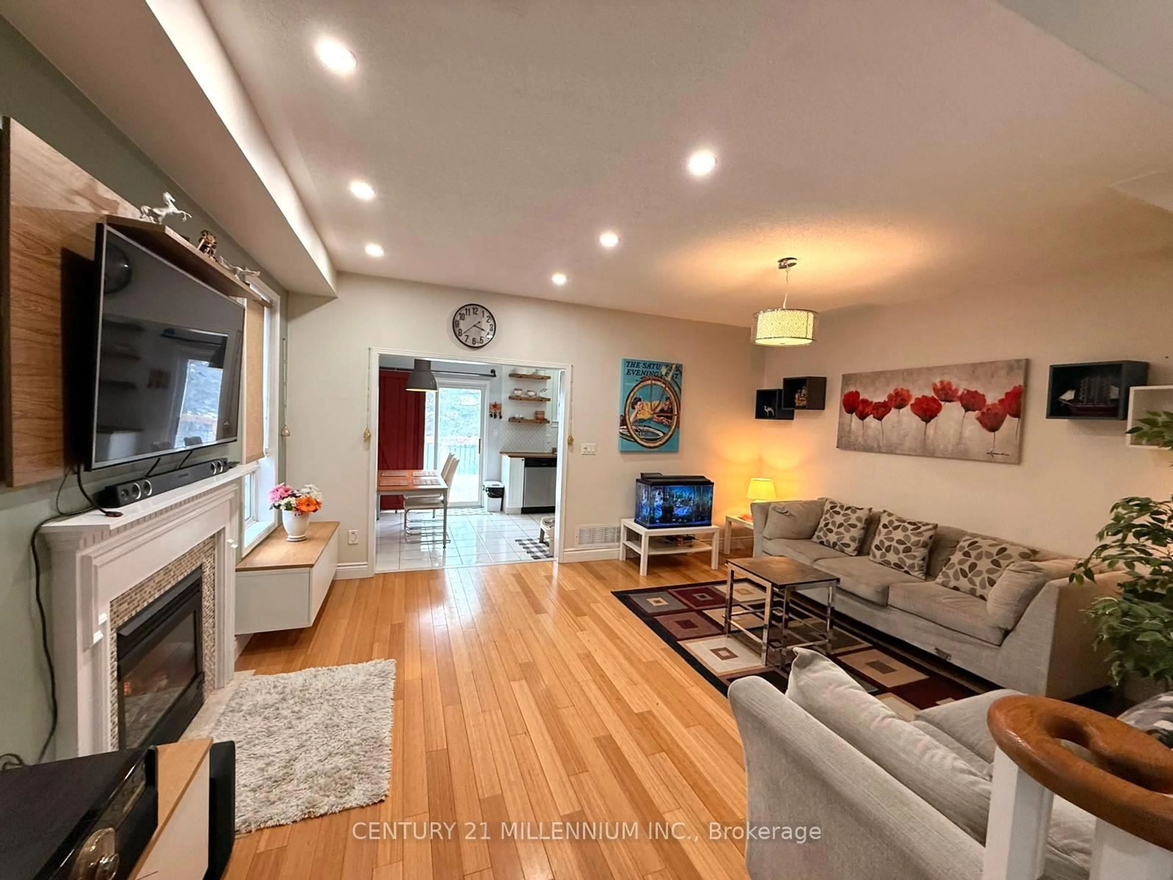 Living room with furniture, wood/laminate floor for 36 Hesketh Crt, Caledon Ontario L7C 1C6