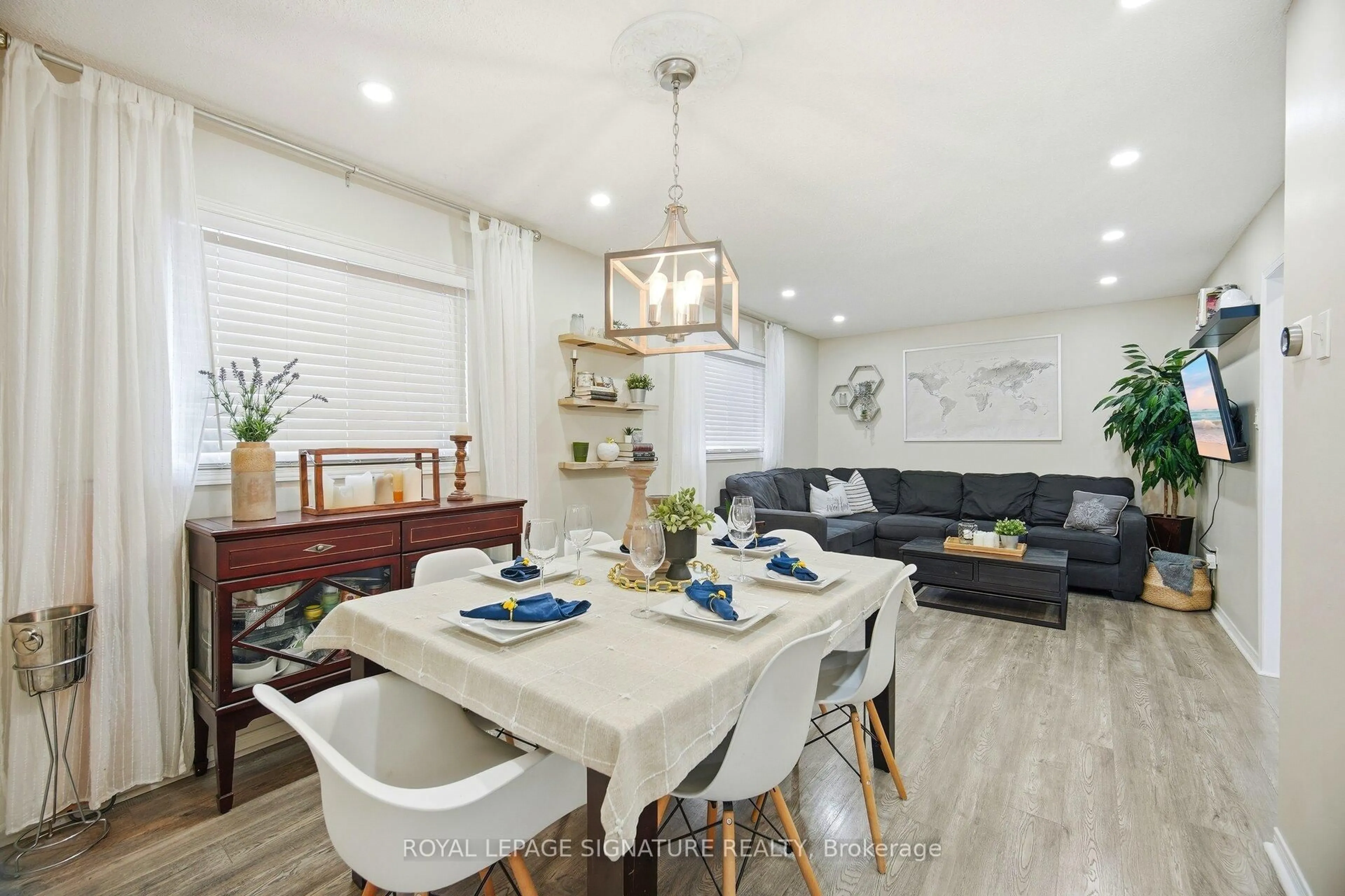 Dining room, wood/laminate floor for 21 Palmolive St, Brampton Ontario L6R 1P5