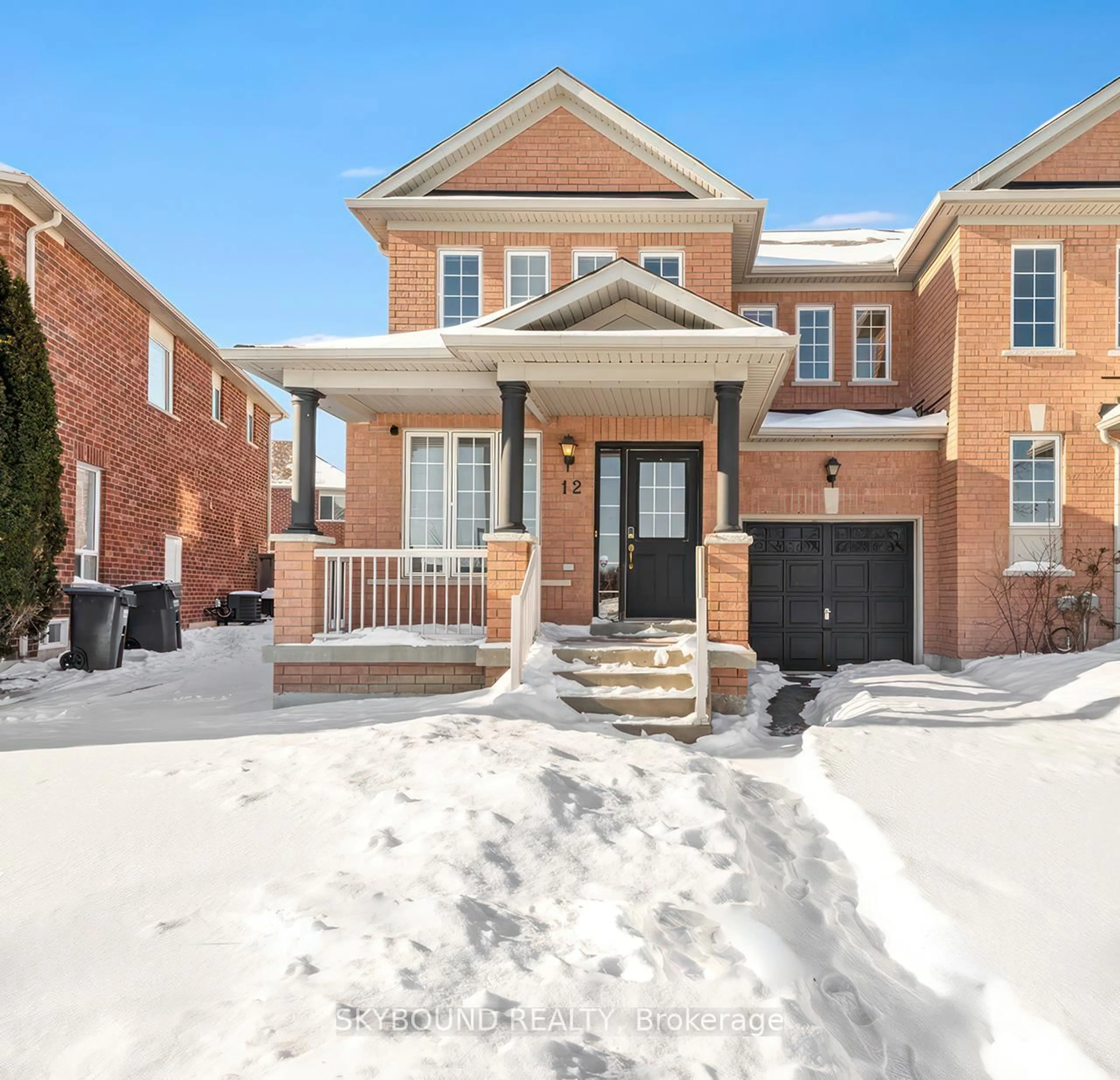 Home with brick exterior material, street for 12 Sled Dog Rd, Brampton Ontario L6R 0H8