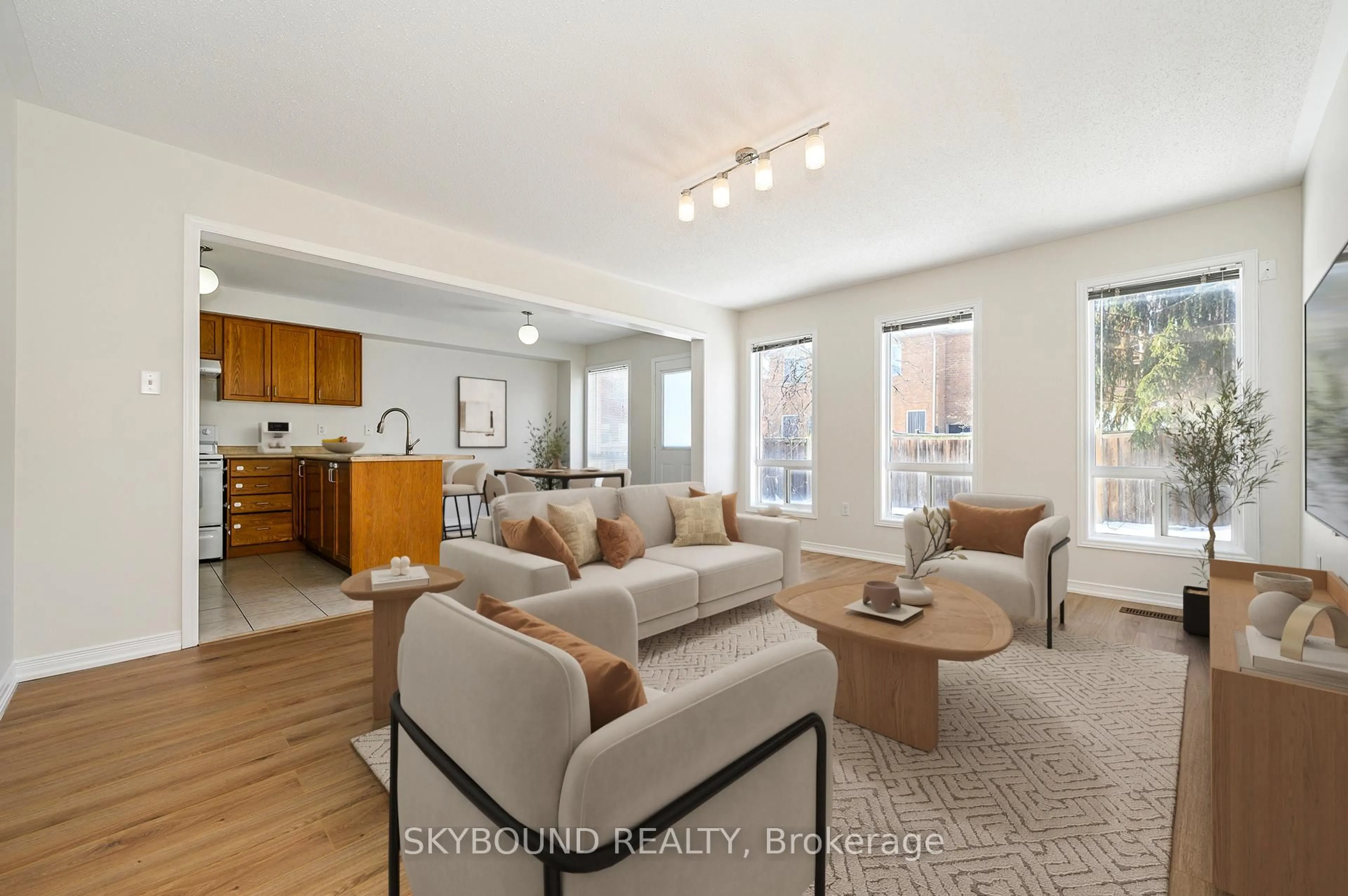 Living room with furniture, unknown for 12 Sled Dog Rd, Brampton Ontario L6R 0H8