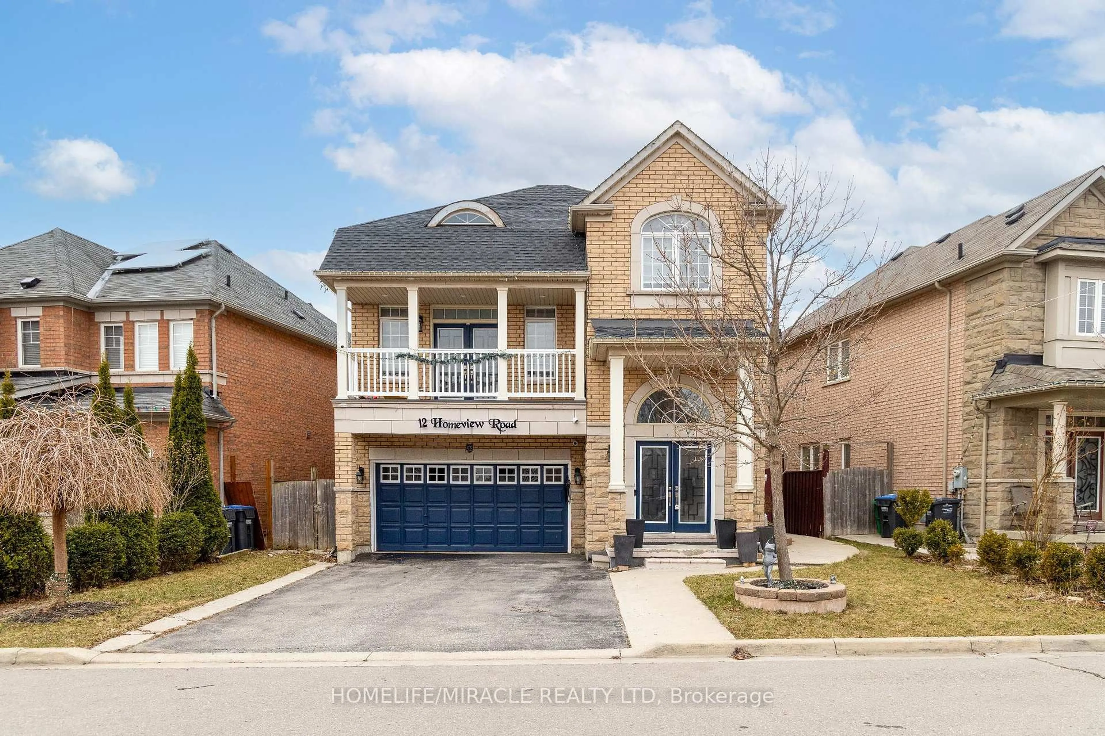 Home with brick exterior material, street for 12 Homeview Rd, Brampton Ontario L6P 2L9