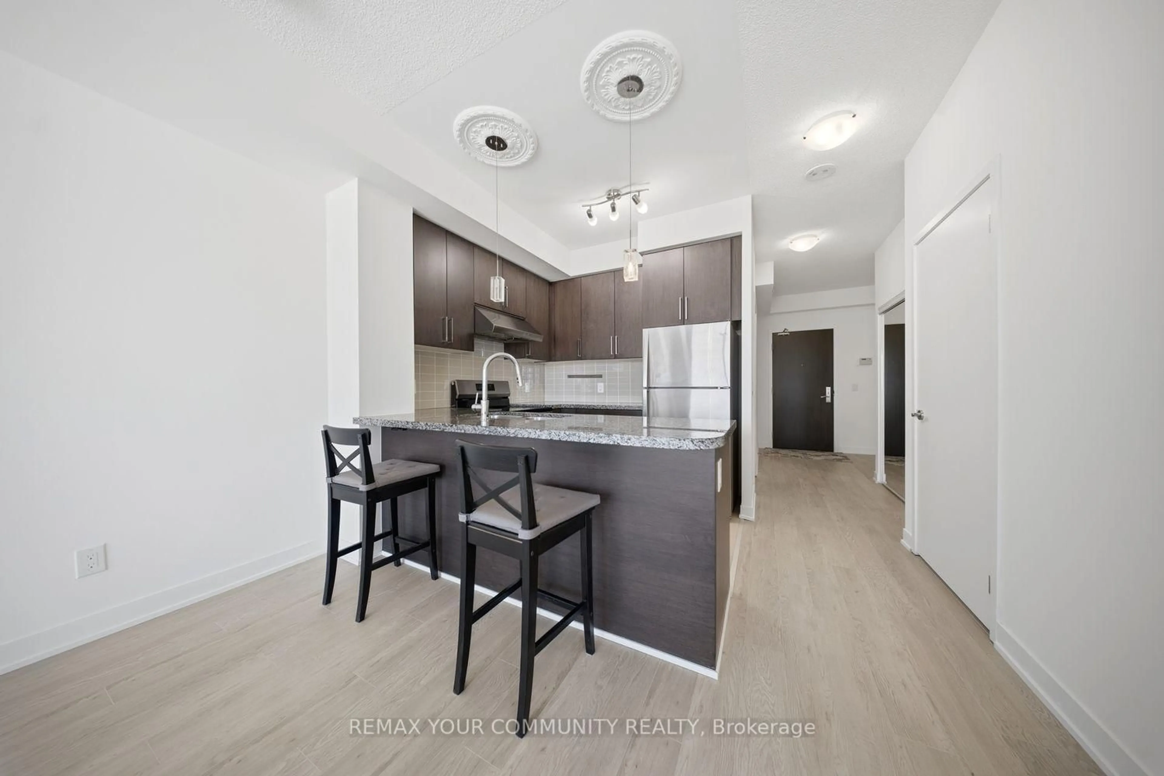 Open concept kitchen, unknown for 840 Queens Plate Dr #510, Toronto Ontario M9W 0E7