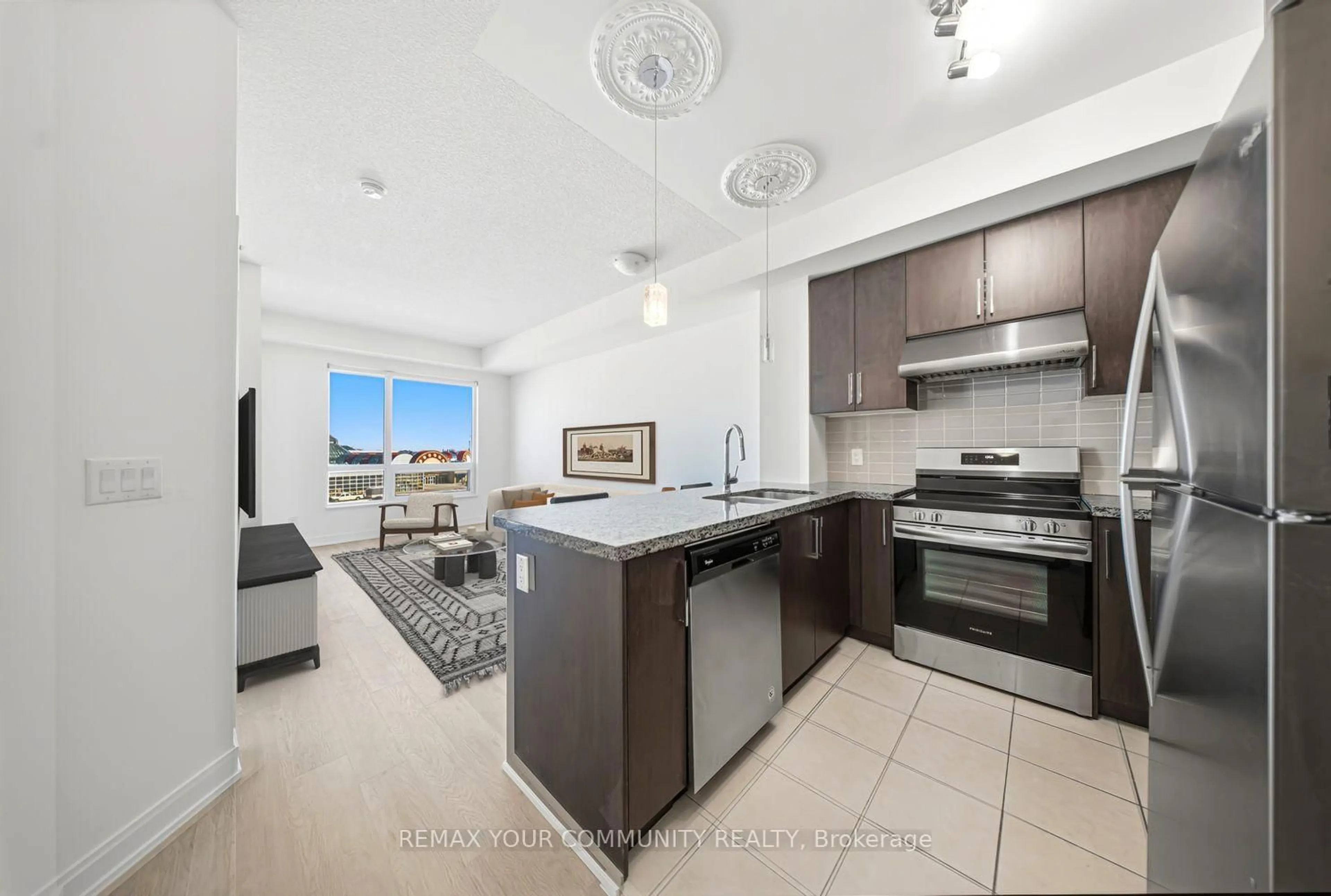 Open concept kitchen, ceramic/tile floor for 840 Queens Plate Dr #510, Toronto Ontario M9W 0E7