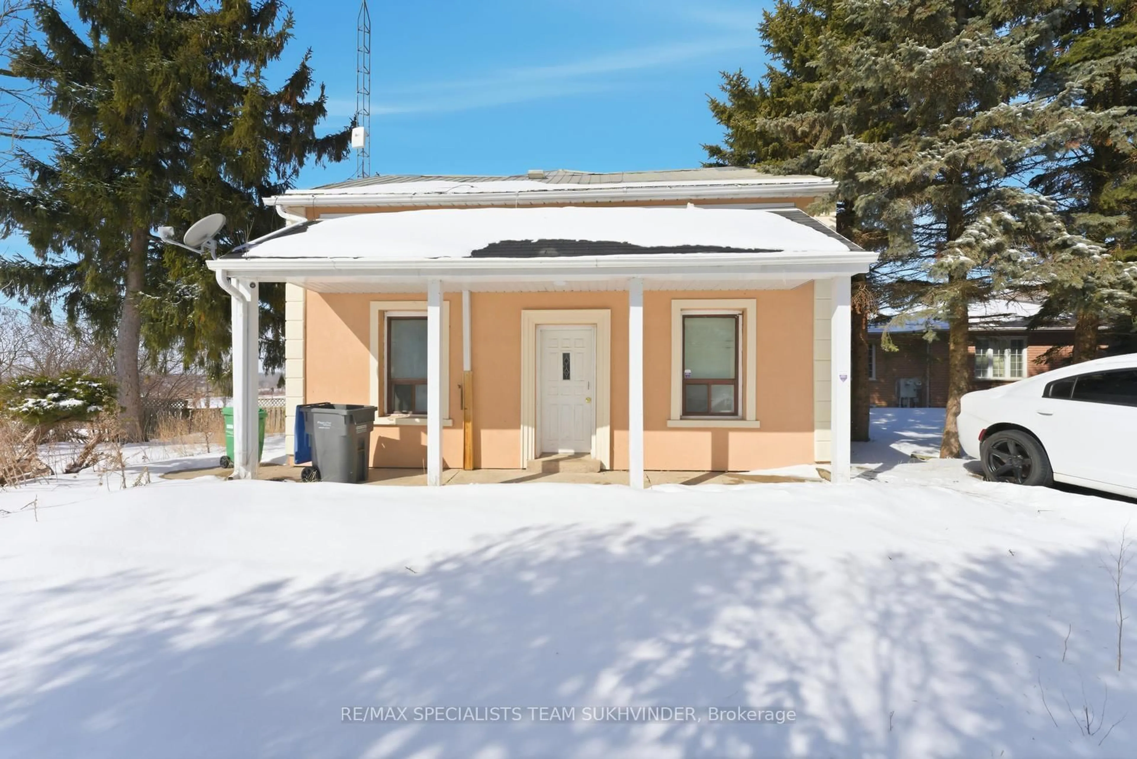 Home with vinyl exterior material, street for 7048 King St, Caledon Ontario L7C 0S3