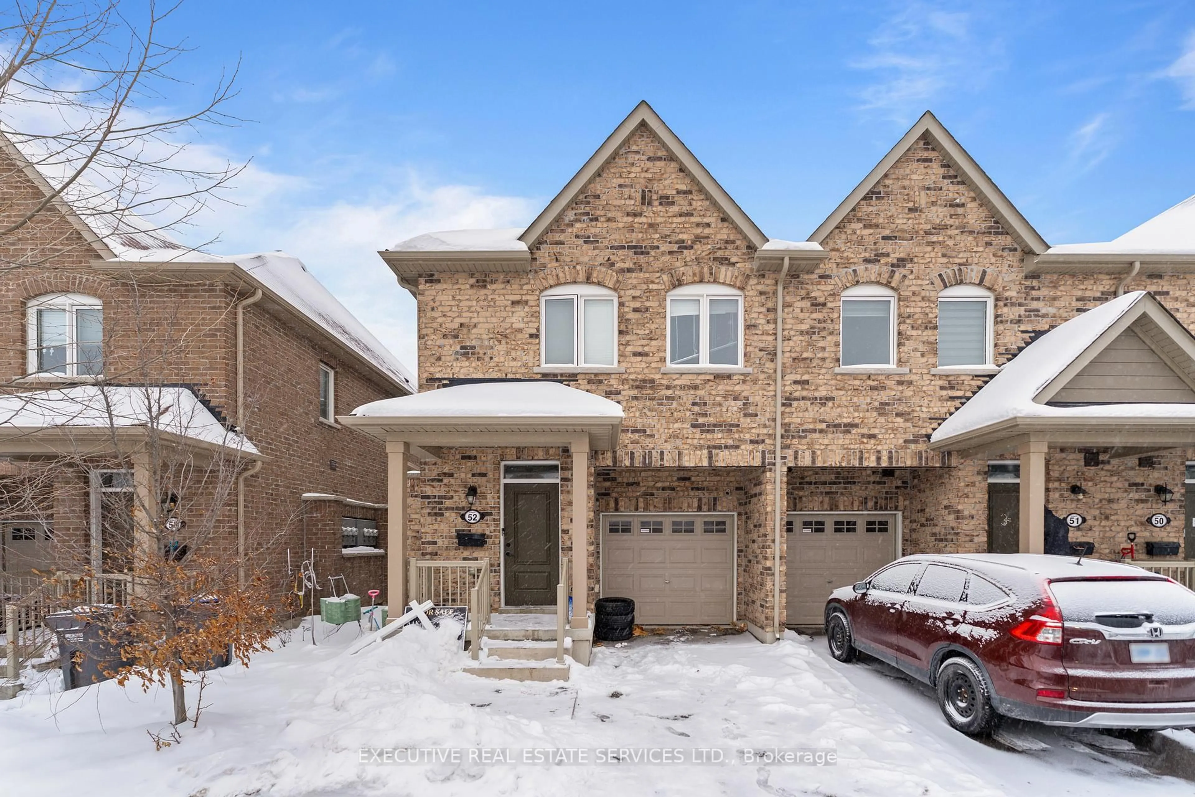 Home with brick exterior material, street for 50 EDINBURGH Dr #52, Brampton Ontario L6Y 1N9
