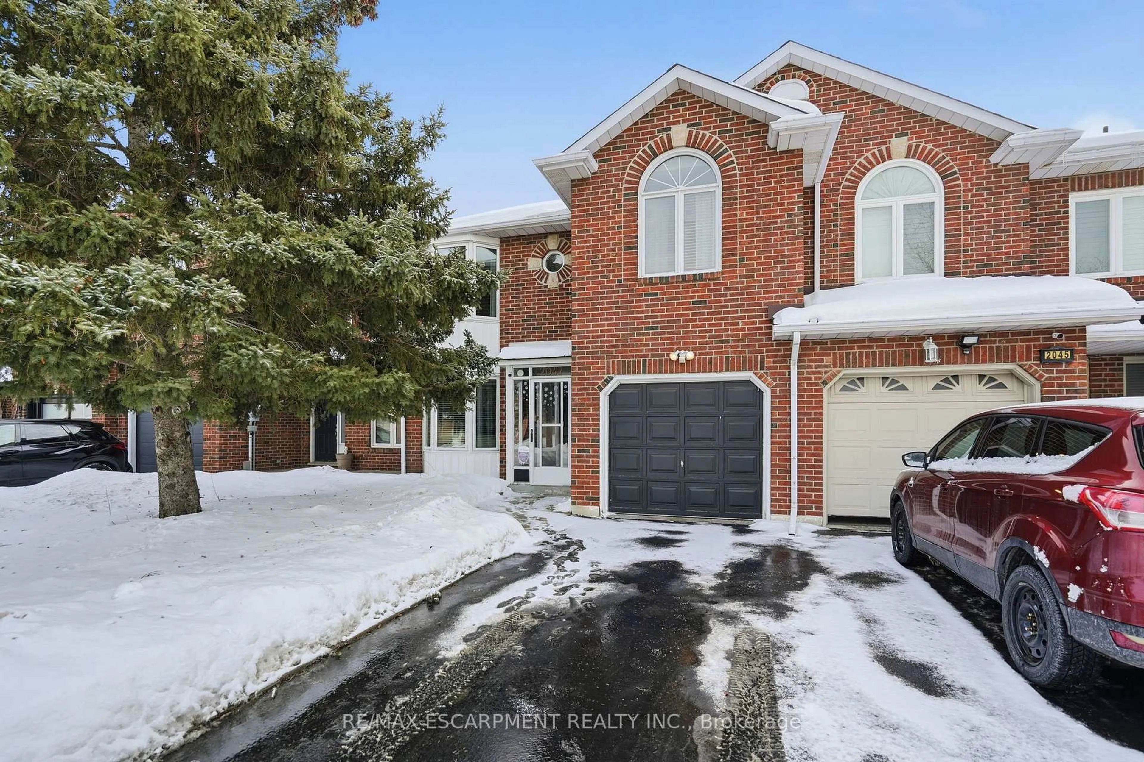 Home with brick exterior material, street for 2047 Chrisdon Rd, Burlington Ontario L7M 3W9