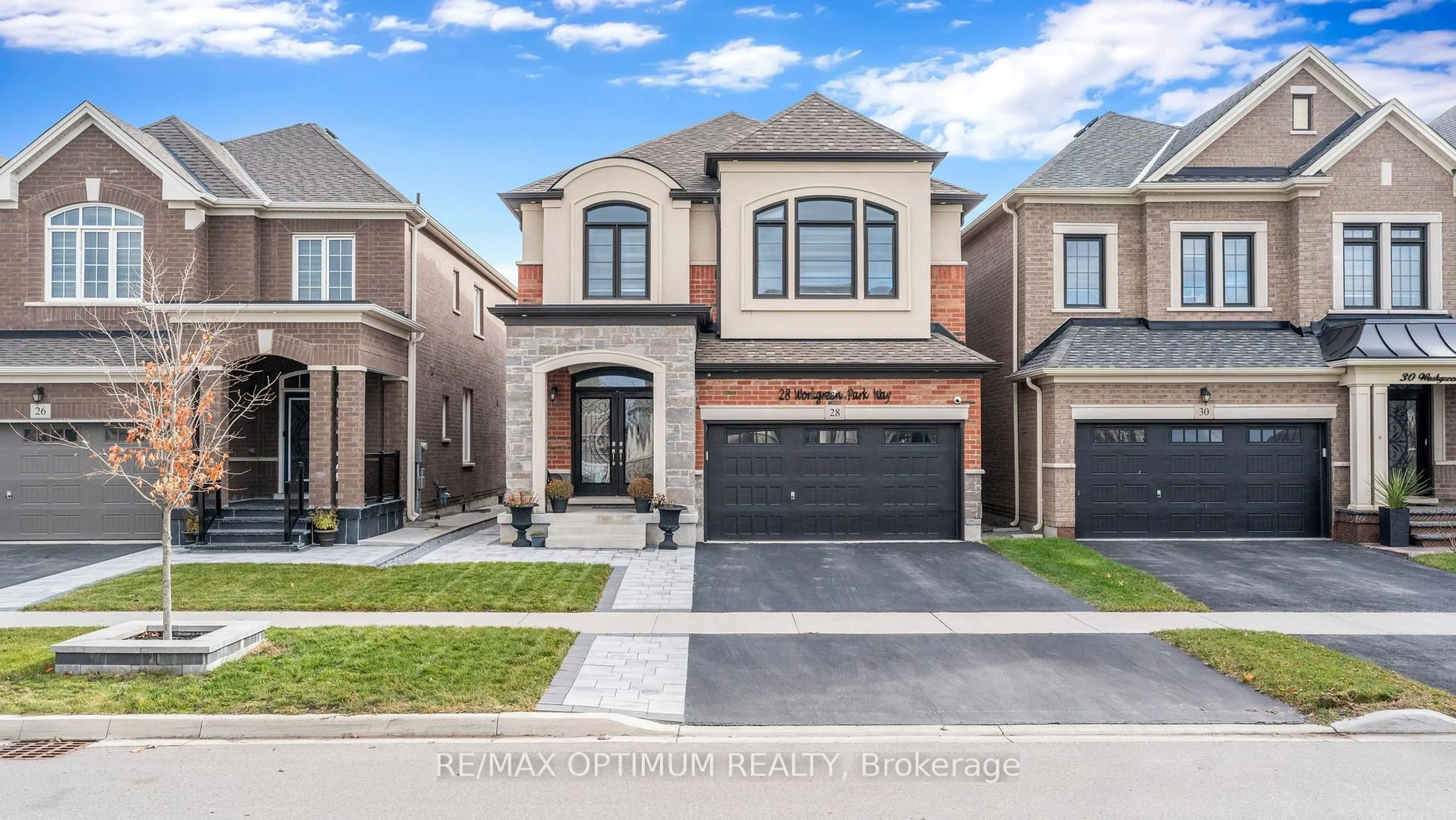 Home with brick exterior material, street for 28 Workgreen Pkwy, Brampton Ontario L6Y 6J5