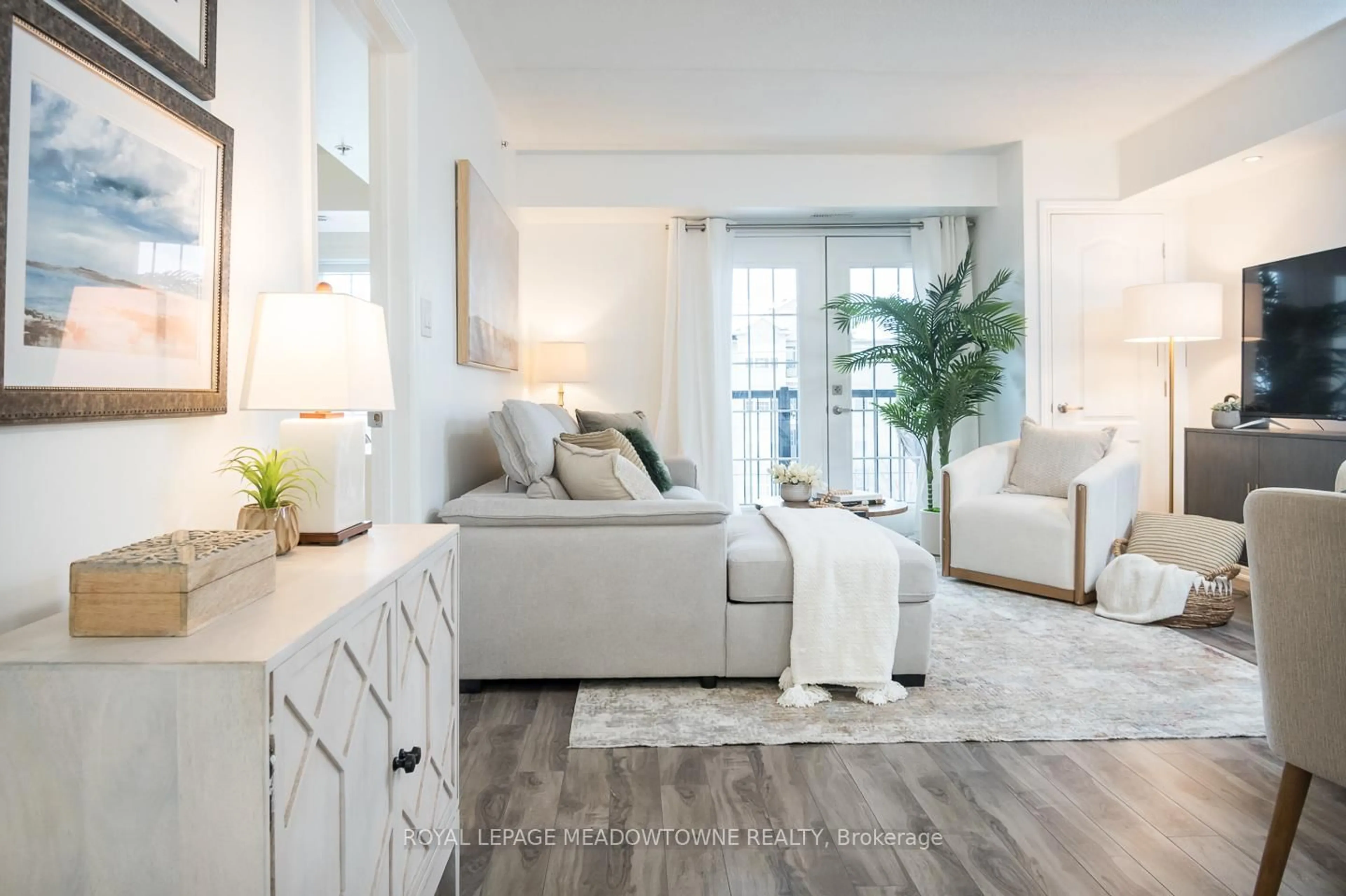 Living room with furniture, unknown for 1440 Main St #312, Milton Ontario L9T 0W3