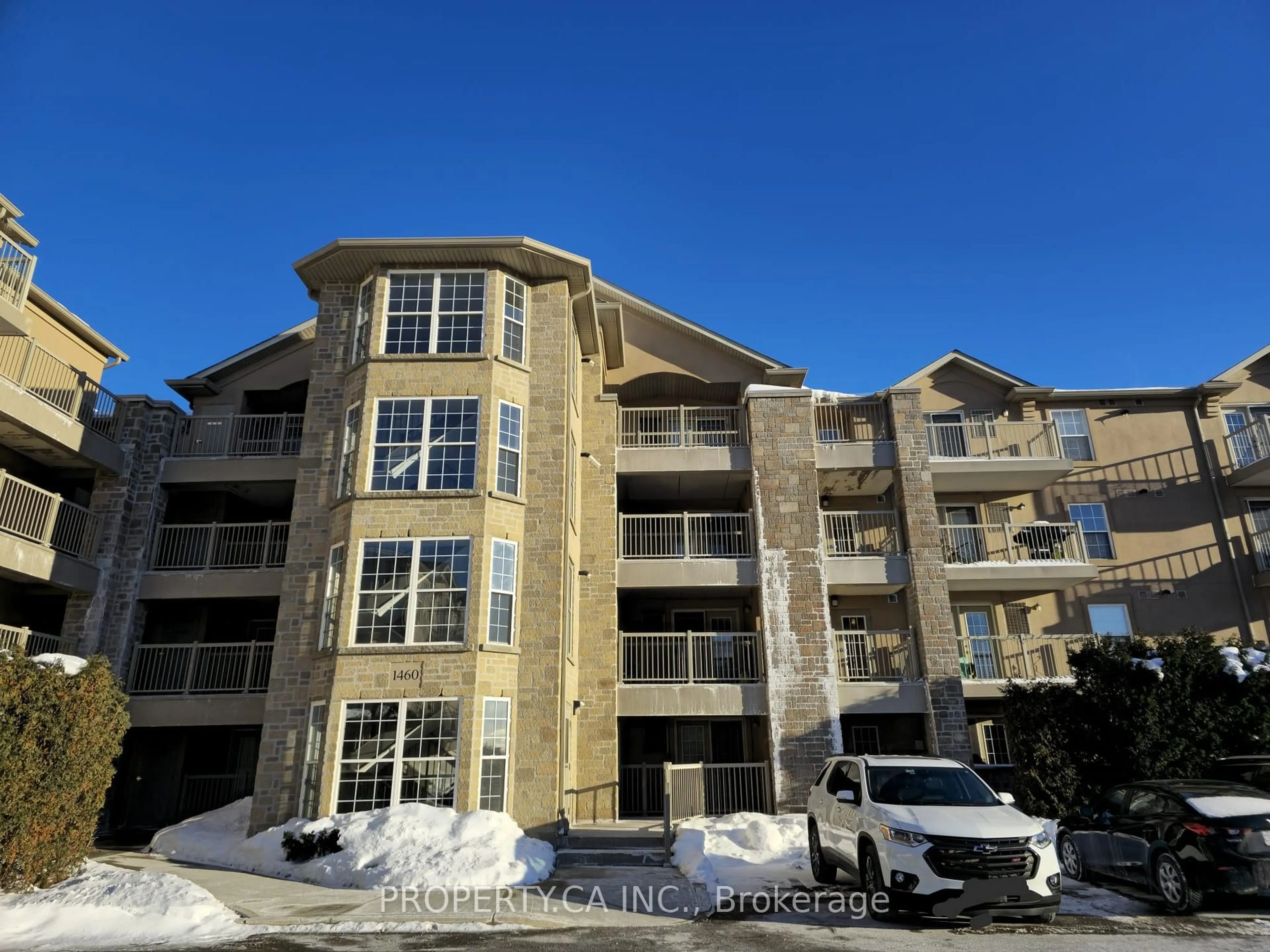 A pic from outside/outdoor area/front of a property/back of a property/a pic from drone, building for 1460 Bishops Gate #406, Oakville Ontario L6M 4N5