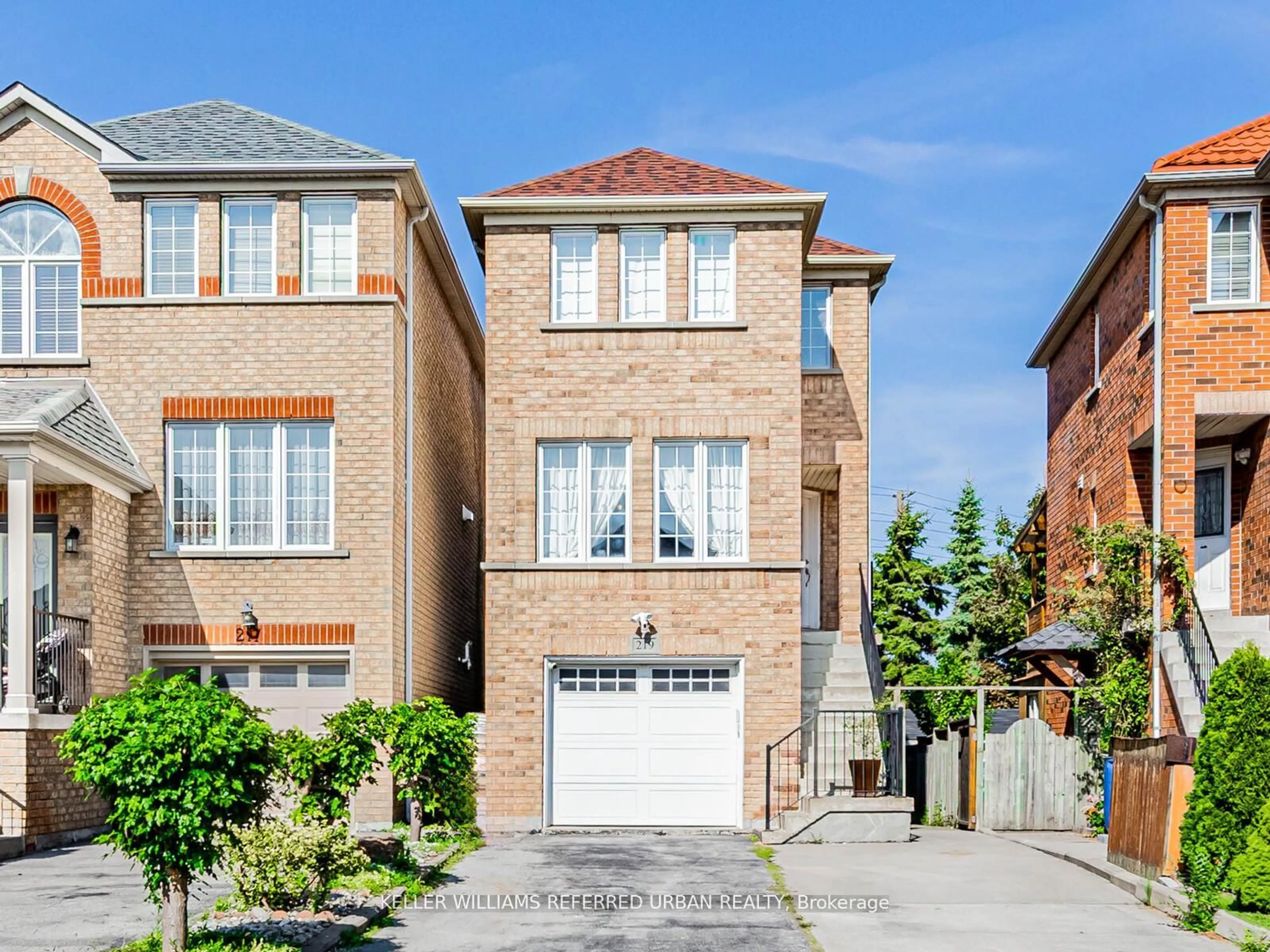 Home with brick exterior material, street for 219 Touchstone Dr, Toronto Ontario M6M 5J9