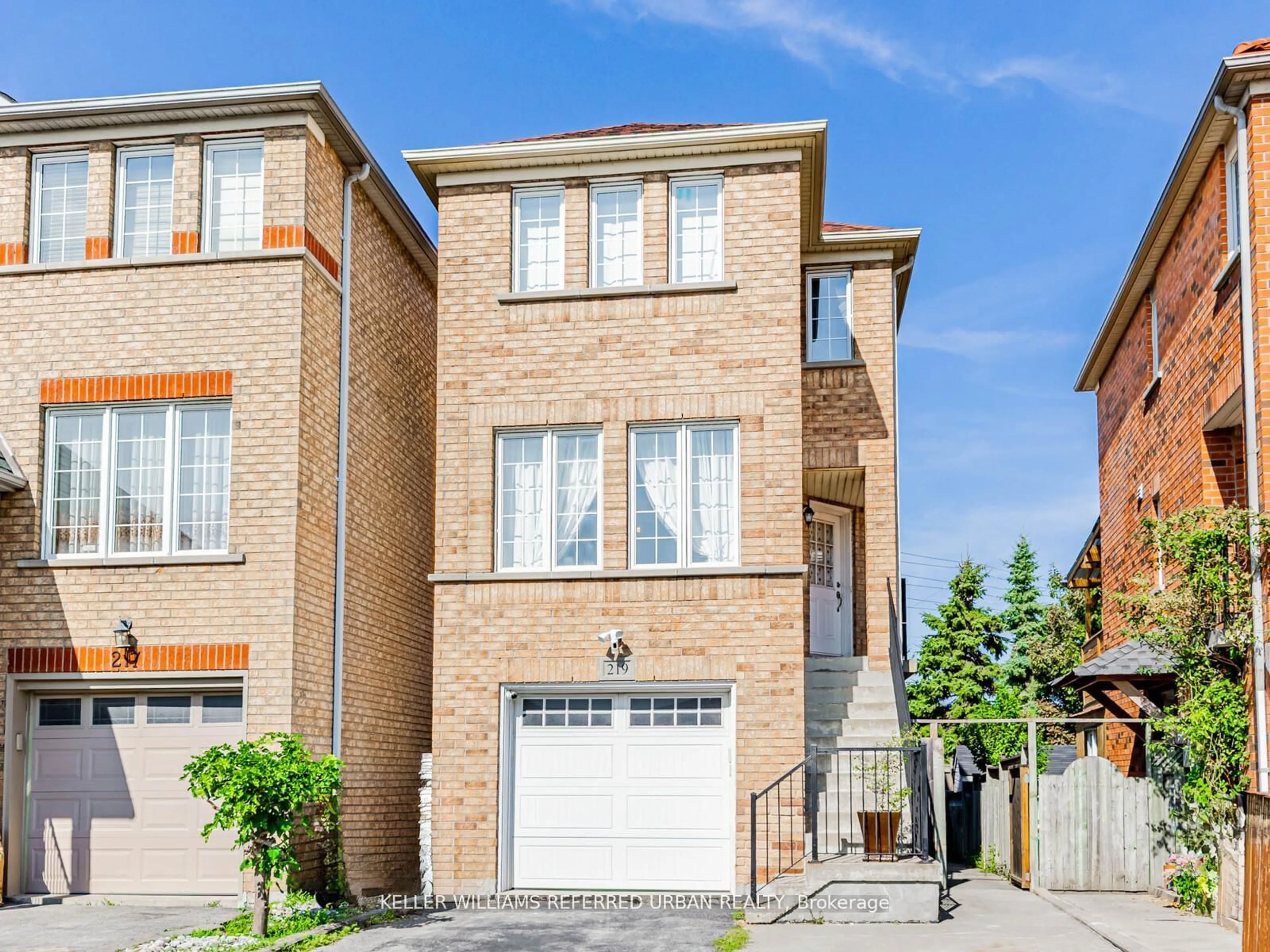 Home with brick exterior material, street for 219 Touchstone Dr, Toronto Ontario M6M 5J9
