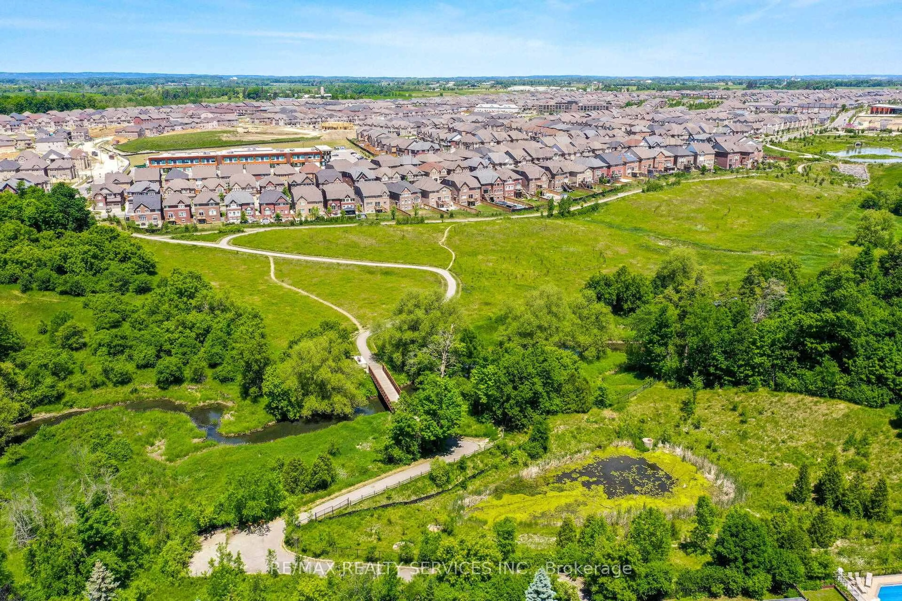 A pic from outside/outdoor area/front of a property/back of a property/a pic from drone, street for 93 Benadir Ave, Caledon Ontario L7C 4E7