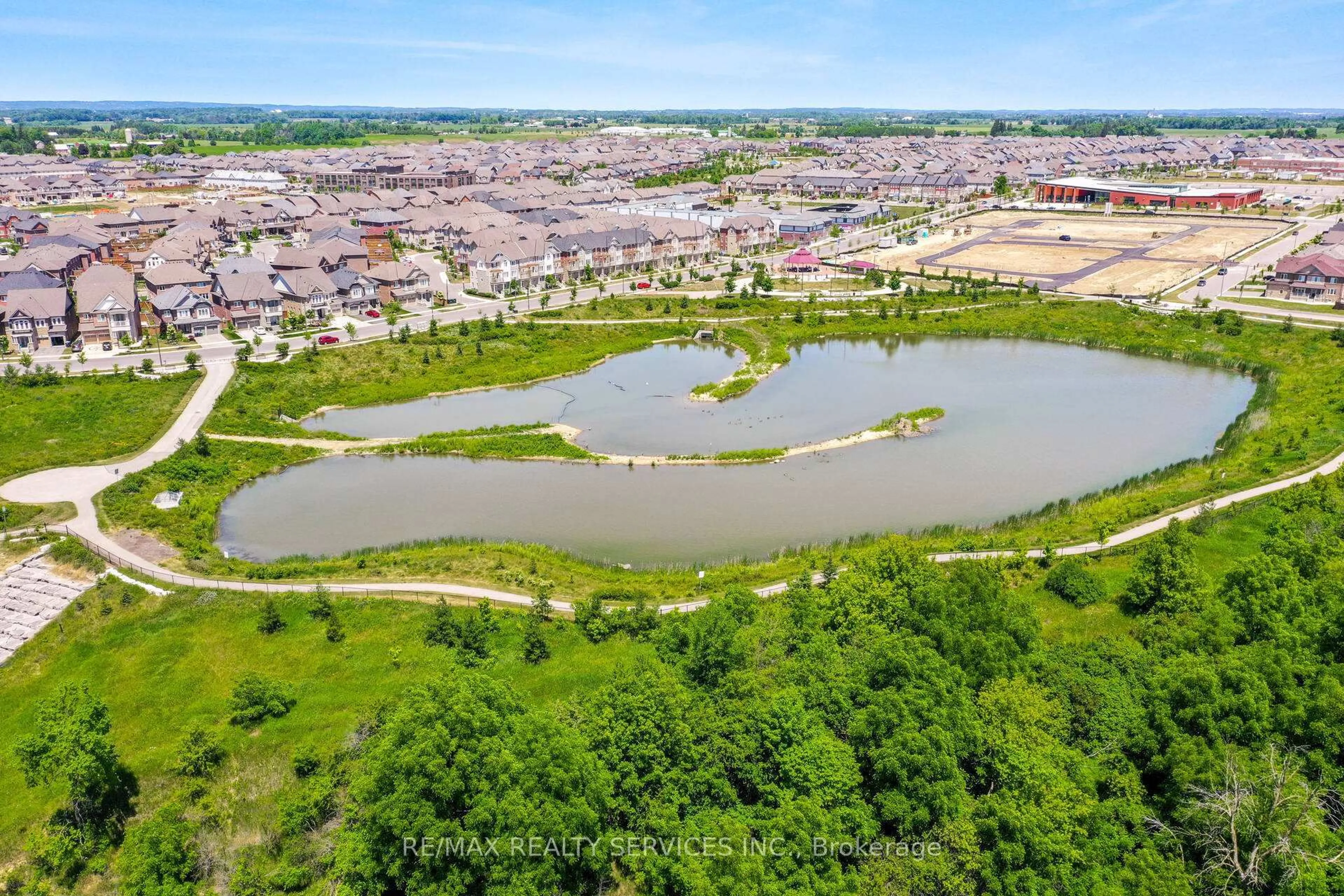 A pic from outside/outdoor area/front of a property/back of a property/a pic from drone, water/lake/river/ocean view for 93 Benadir Ave, Caledon Ontario L7C 4E7