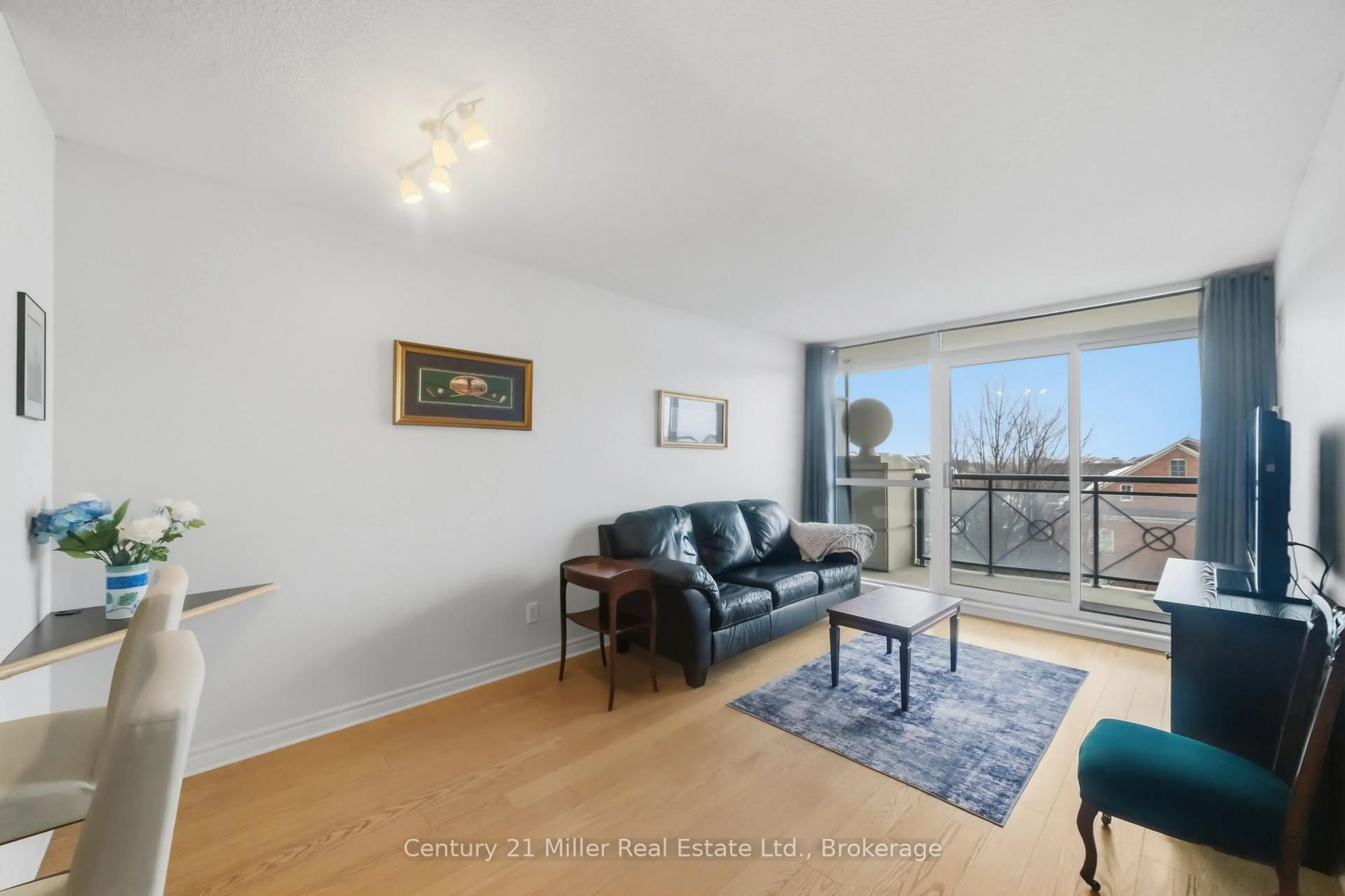 Living room with furniture, unknown for 2325 Central Park Dr #407, Oakville Ontario L6H 0E2