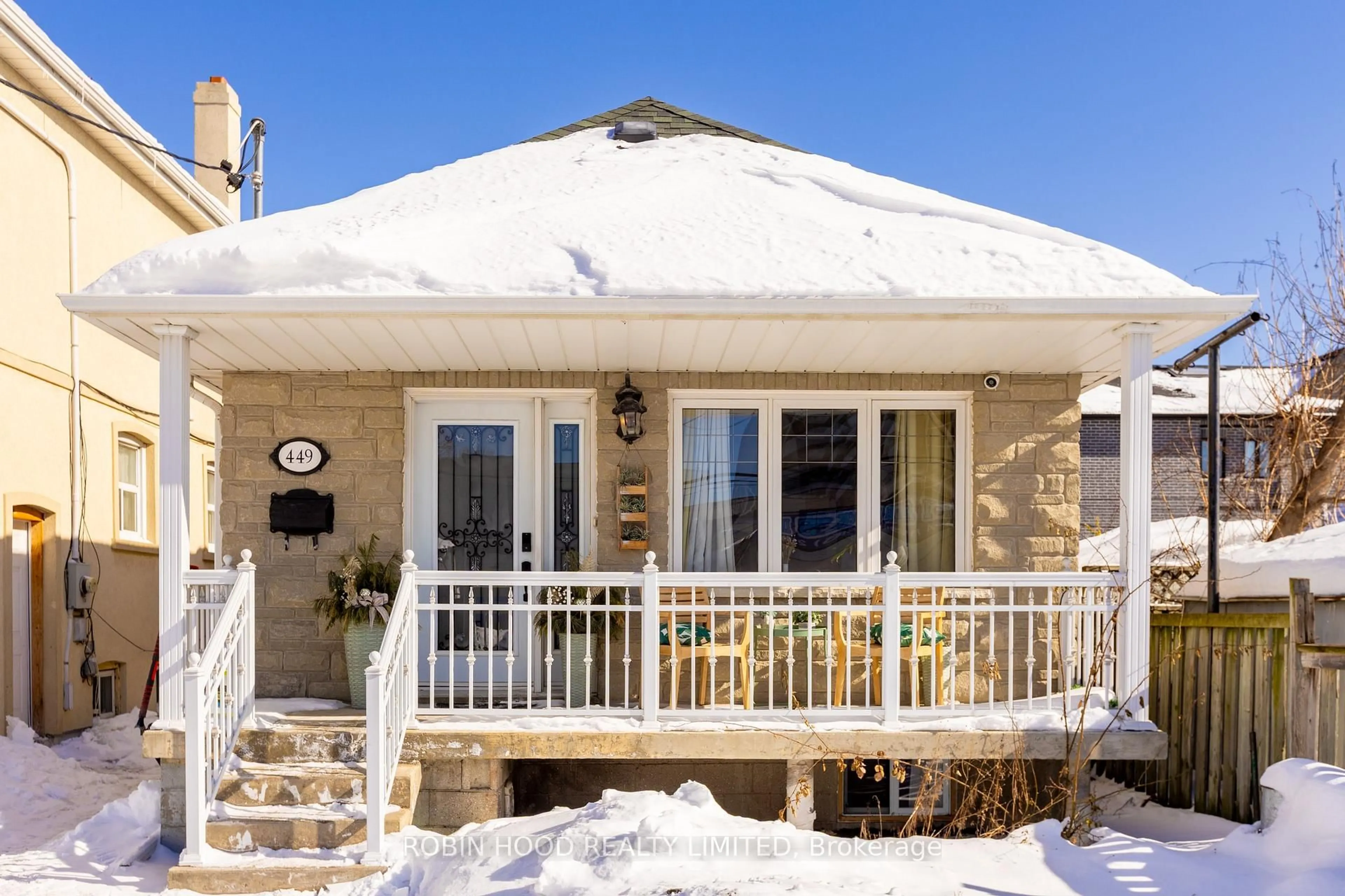 Home with vinyl exterior material, street for 449 Gilbert Ave, Toronto Ontario M6E 4X4