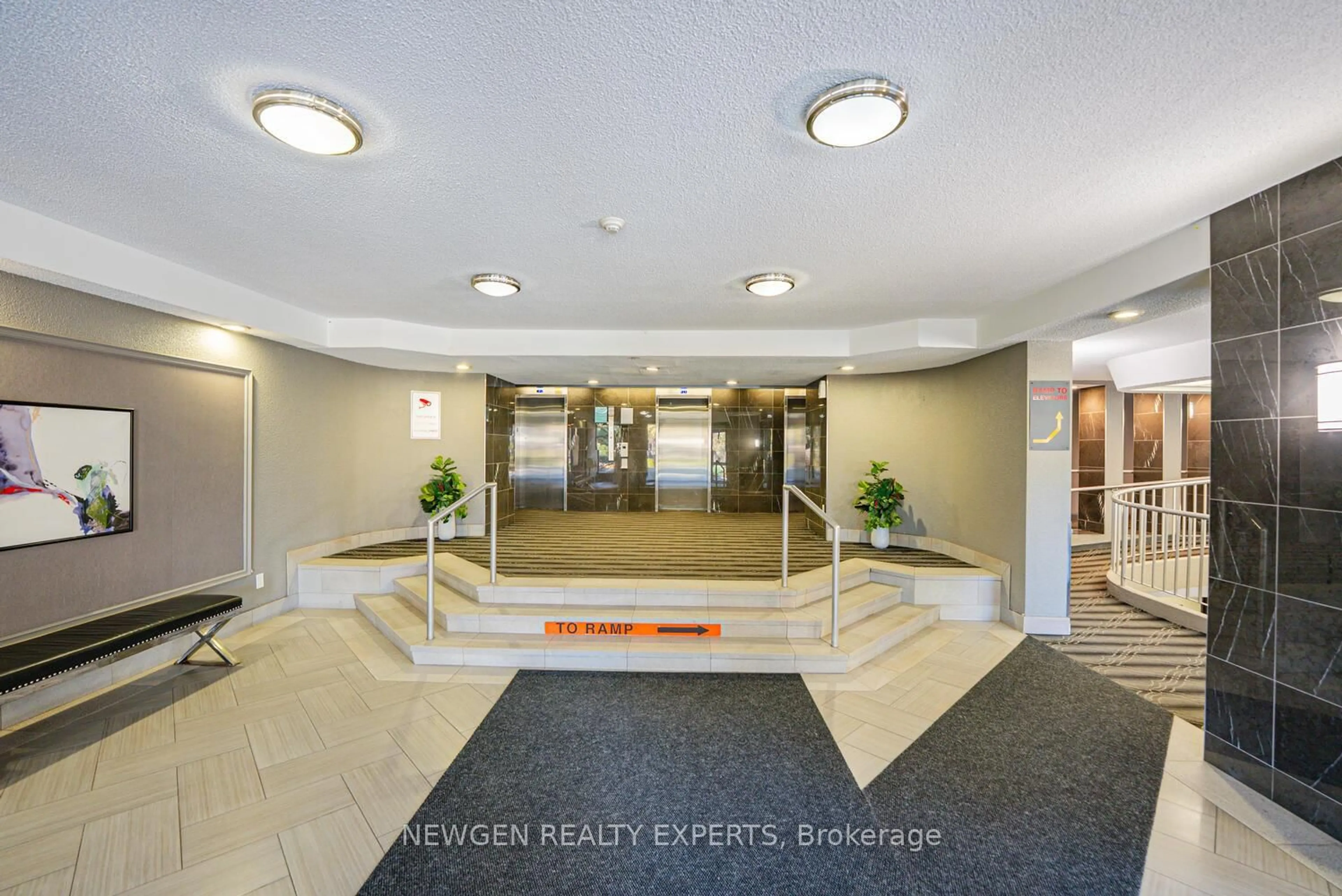 Indoor foyer for 8 Lisa St #307, Brampton Ontario L6T 4S6