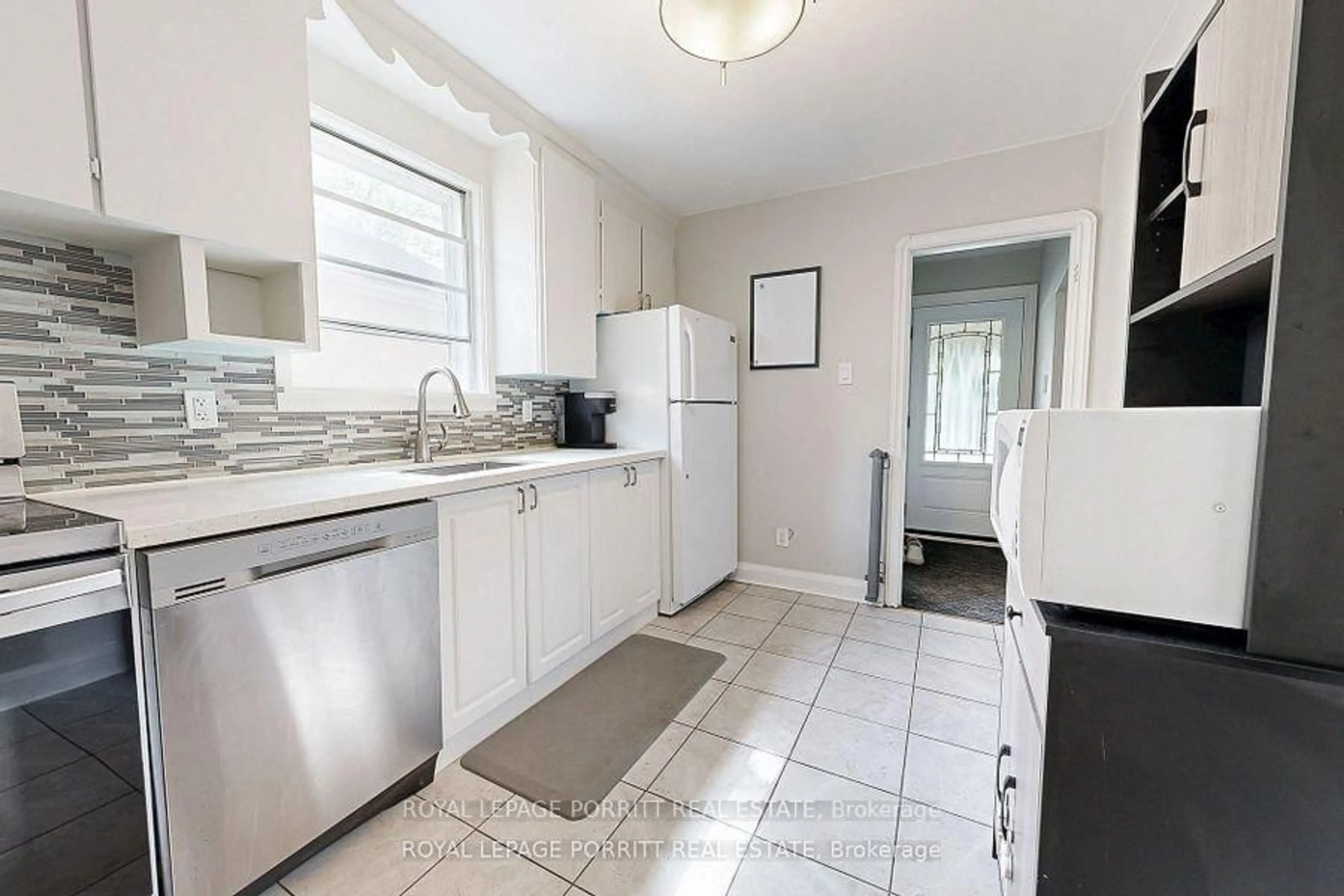 Standard kitchen, ceramic/tile floor for 217 Alderbrae Ave, Toronto Ontario M8W 4K4