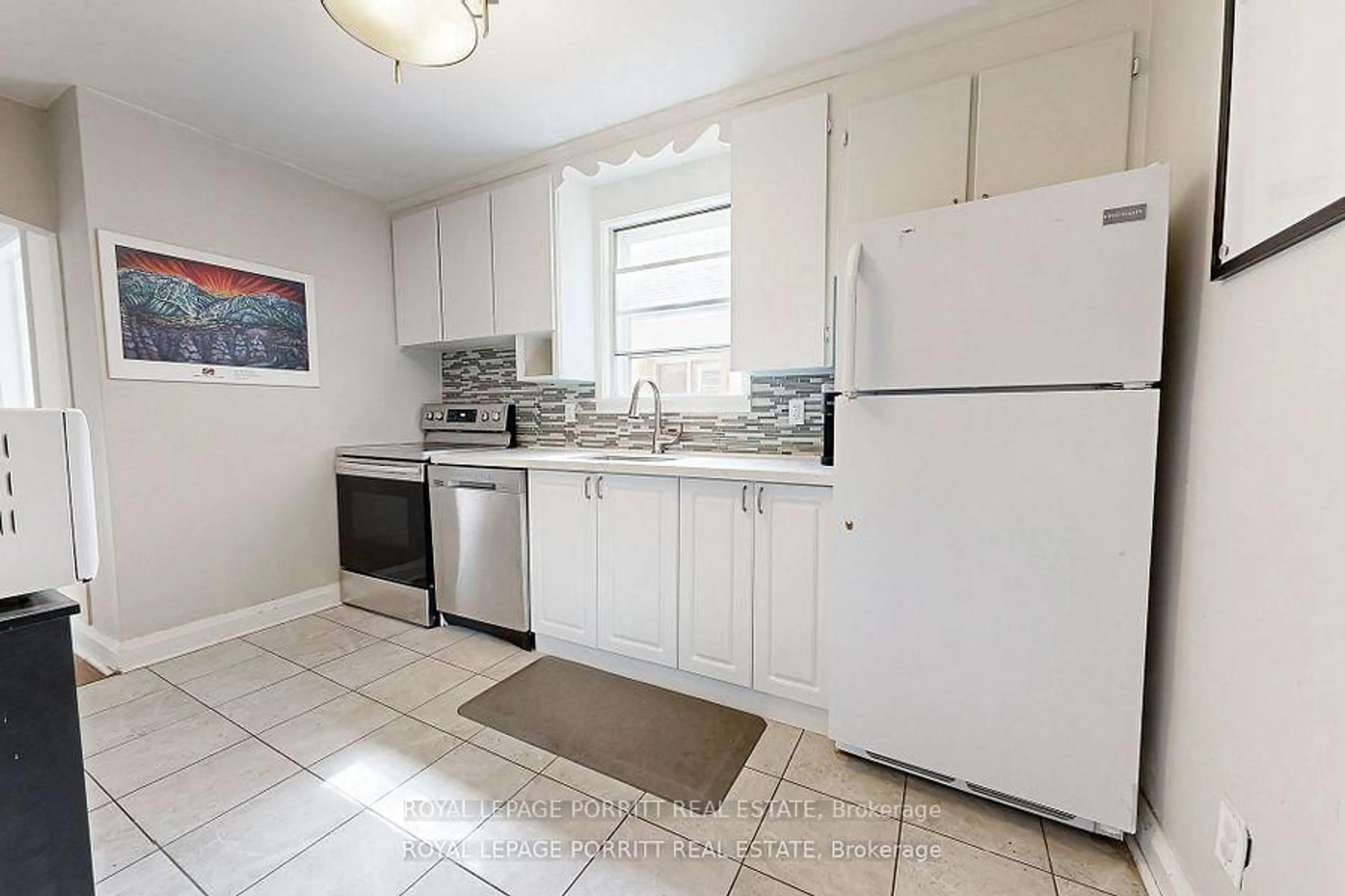 Standard kitchen, ceramic/tile floor for 217 Alderbrae Ave, Toronto Ontario M8W 4K4