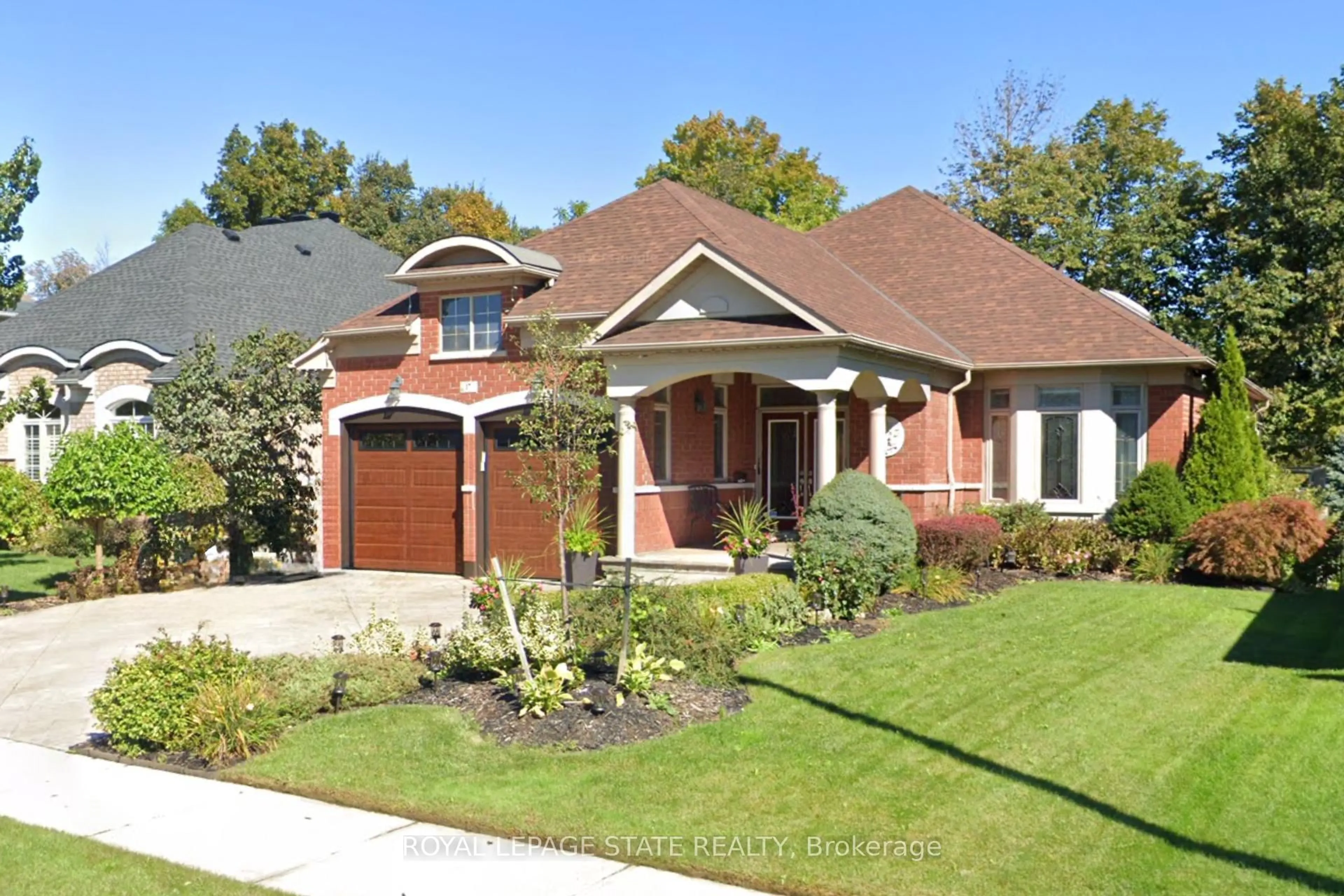 Home with brick exterior material, street for 17 Mcnutt St, Brampton Ontario L6Y 5L3