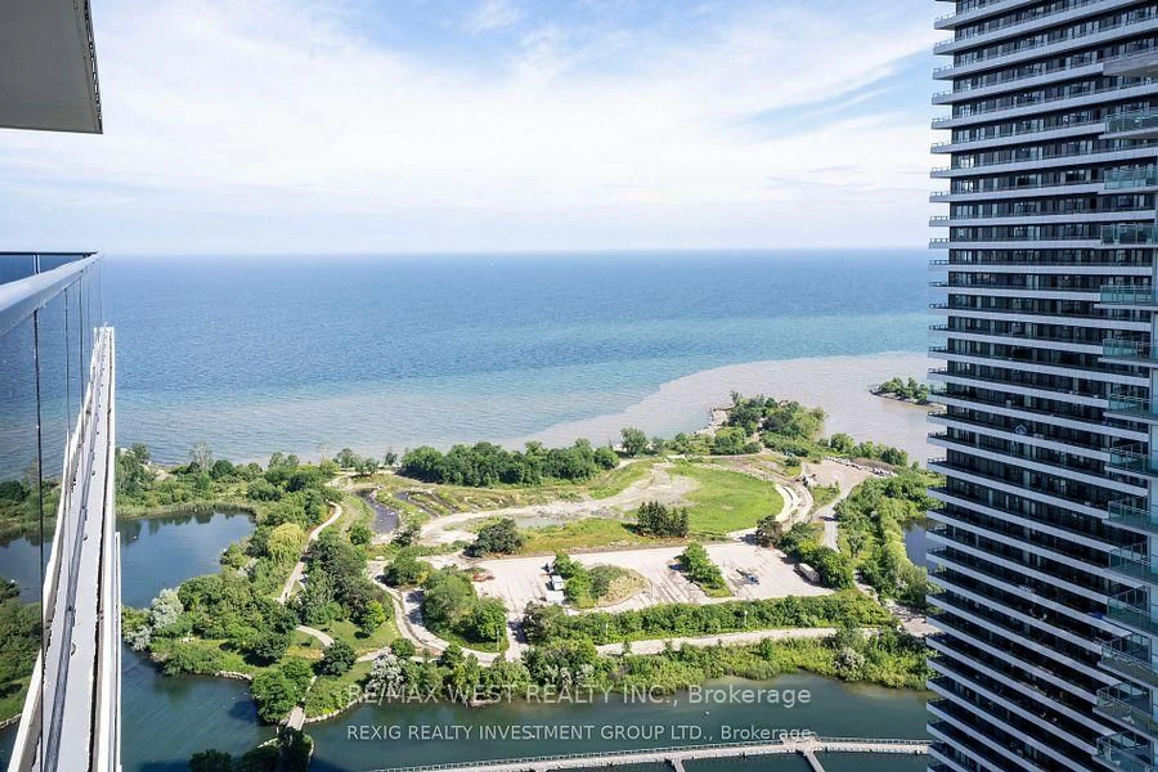 A pic from outside/outdoor area/front of a property/back of a property/a pic from drone, water/lake/river/ocean view for 70 Annie Craig Dr #4007, Toronto Ontario M8V 0G2