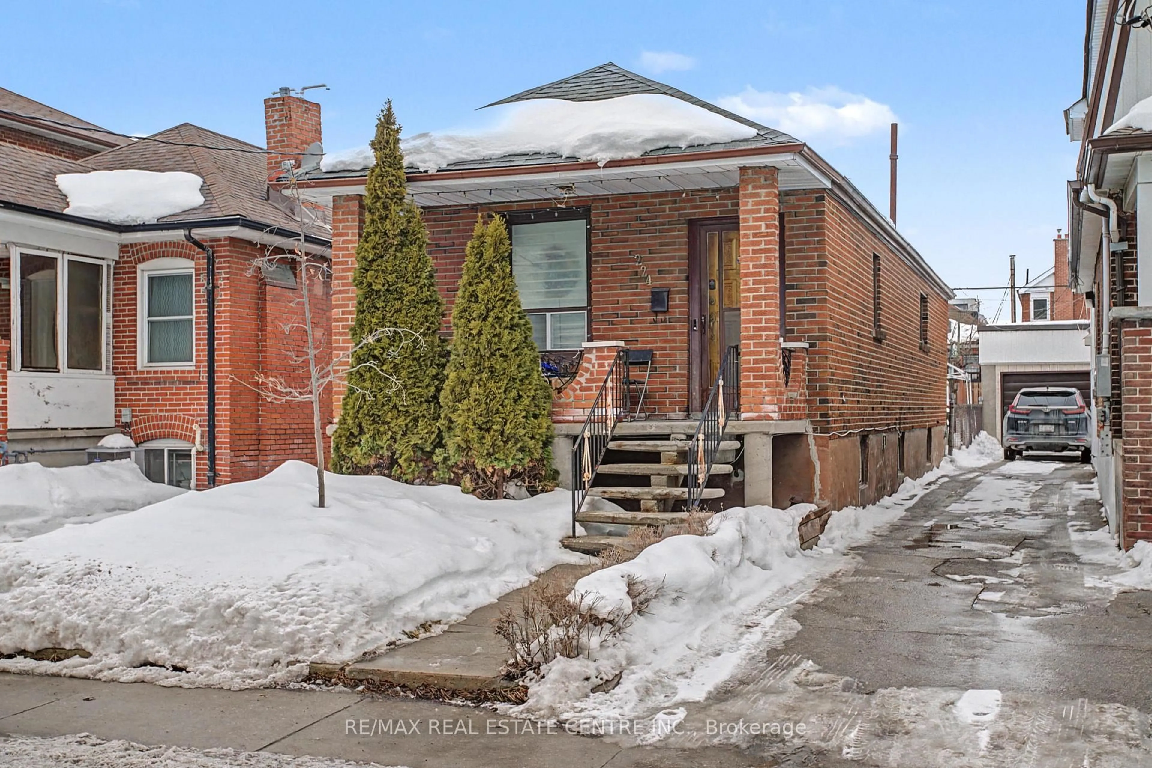 Home with brick exterior material, street for 224 Livingstone Ave, Toronto Ontario M6E 2M2