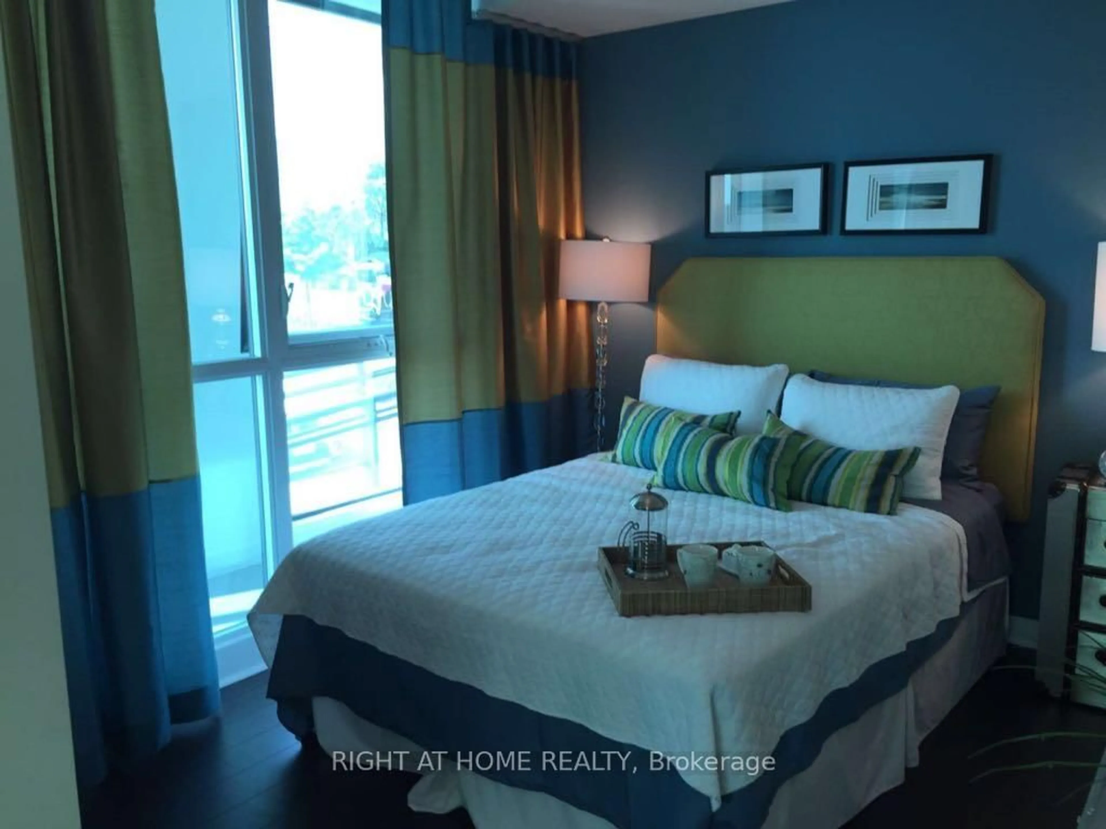 Bedroom with bed, wood/laminate floor for 5025 Four Springs Ave #1407, Mississauga Ontario L5R 0G5