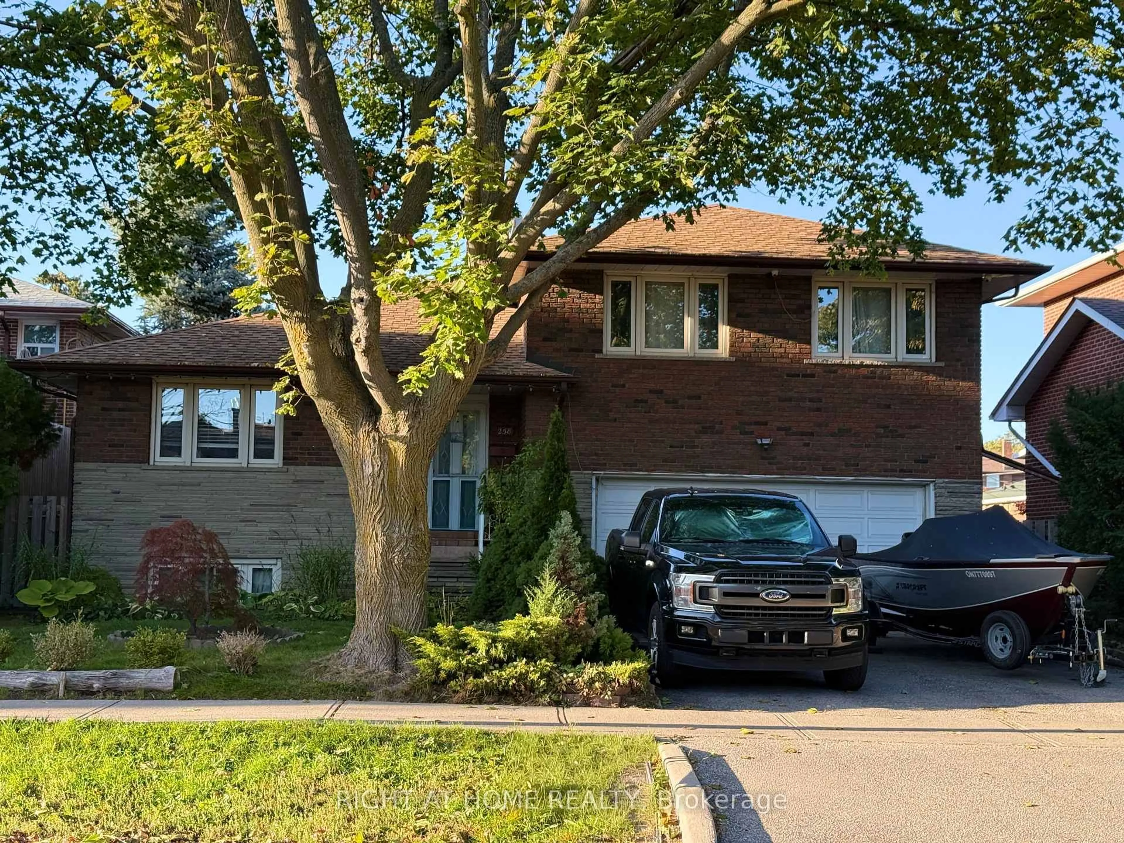 Home with brick exterior material, street for 258 La Rose Ave, Toronto Ontario M9P 1B7